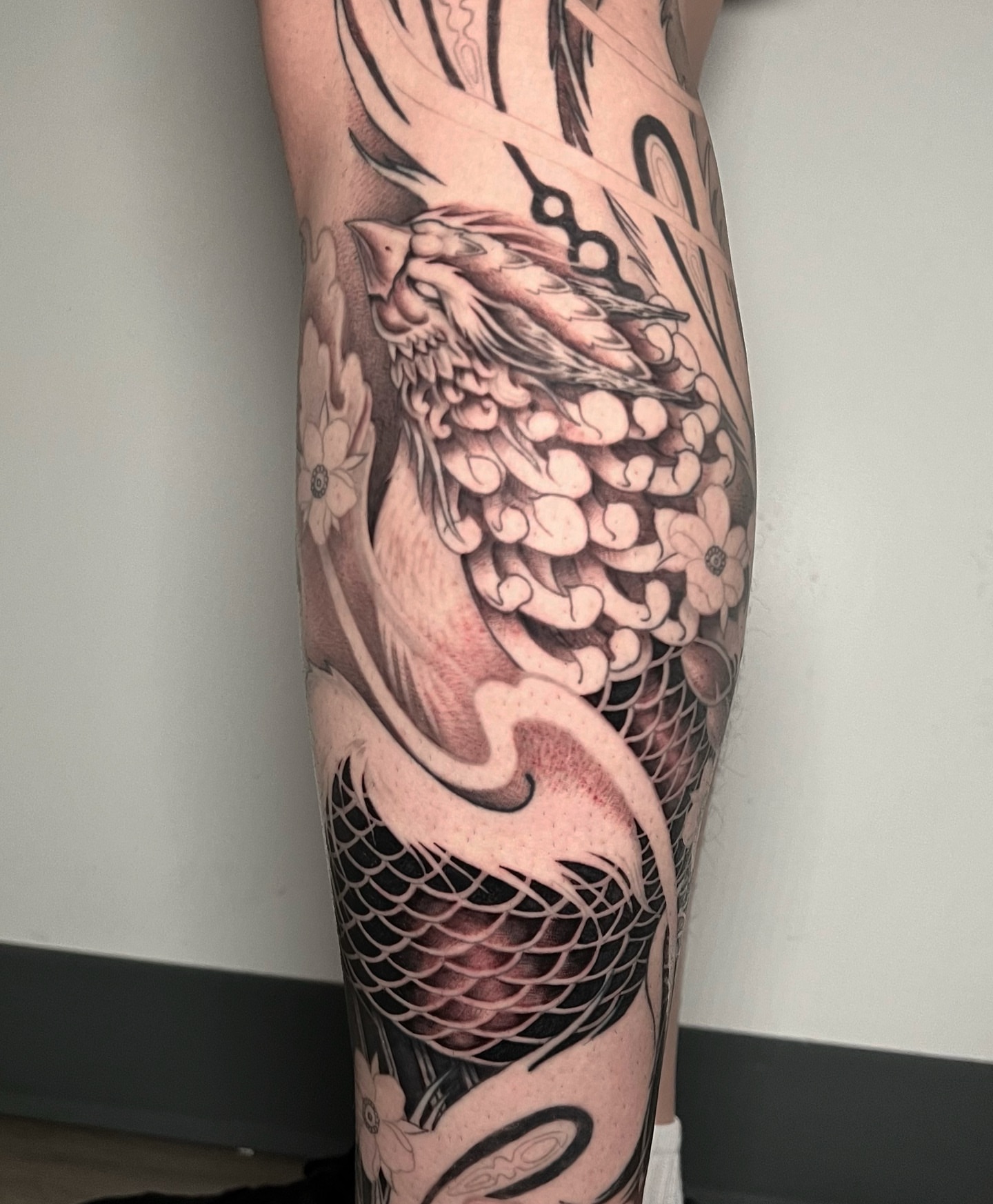 Koi fish japanese irezumi tattoo on the calf by Johnson