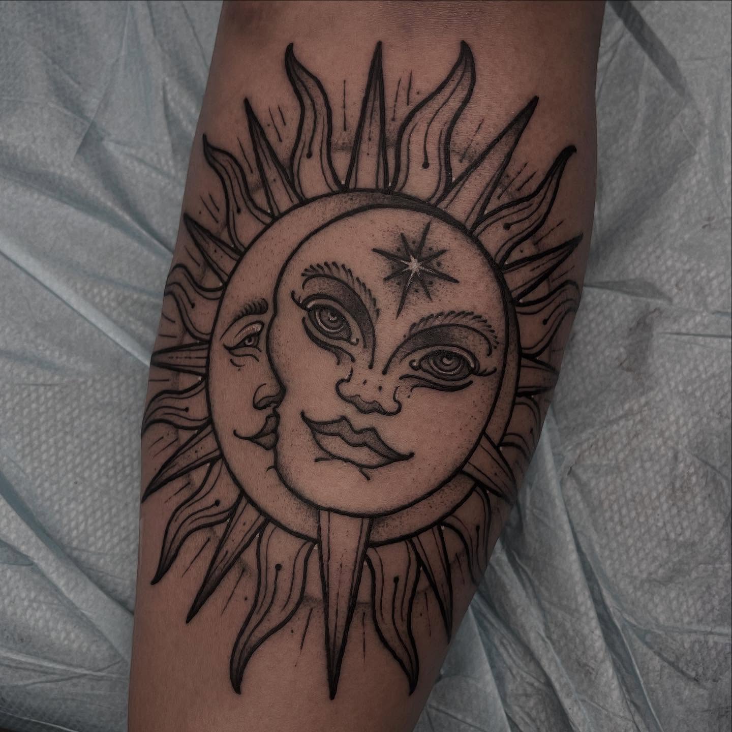 Sun and moon faces realism tattoo on the forearm by Brandon Mola, Chicago, Illinois