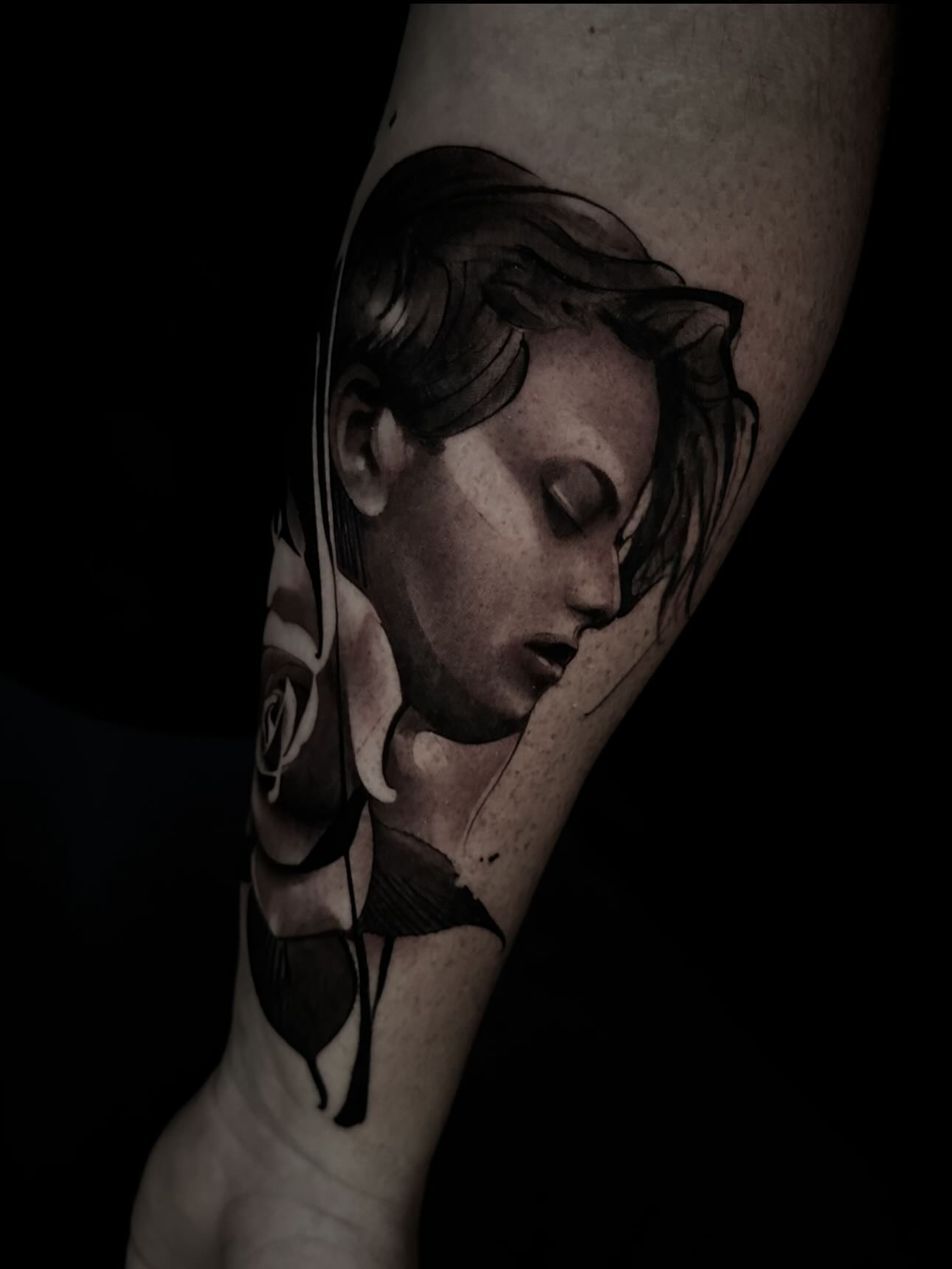 Woman's face realism tattoo on the forearm by Nathan Adsit