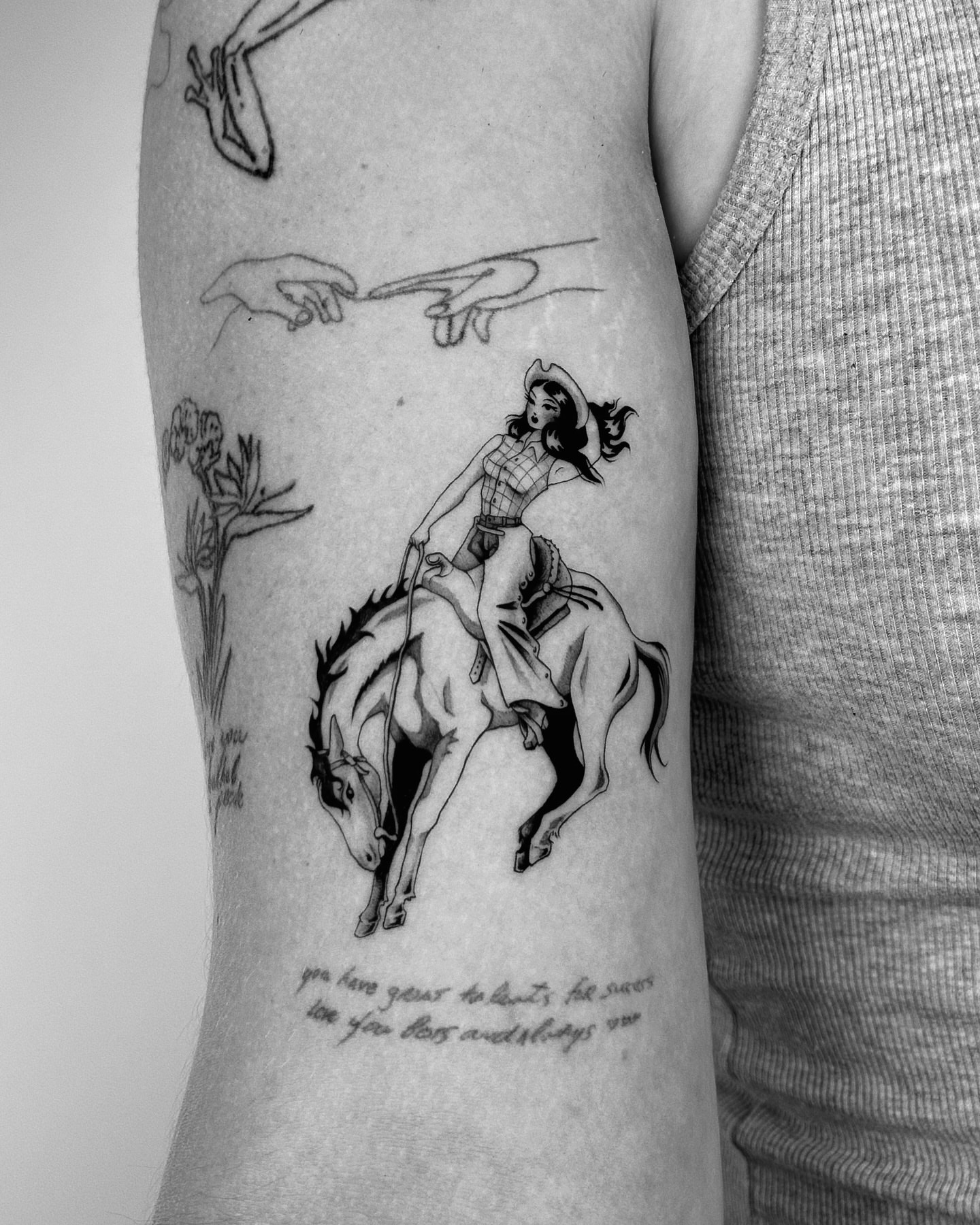 Cowgirl riding horse realism tattoo on the forearm by Montana Chambers