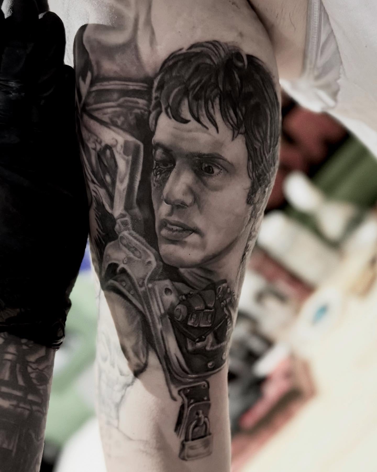 Portrait of a man realism tattoo on the forearm by Blake Van Vleck