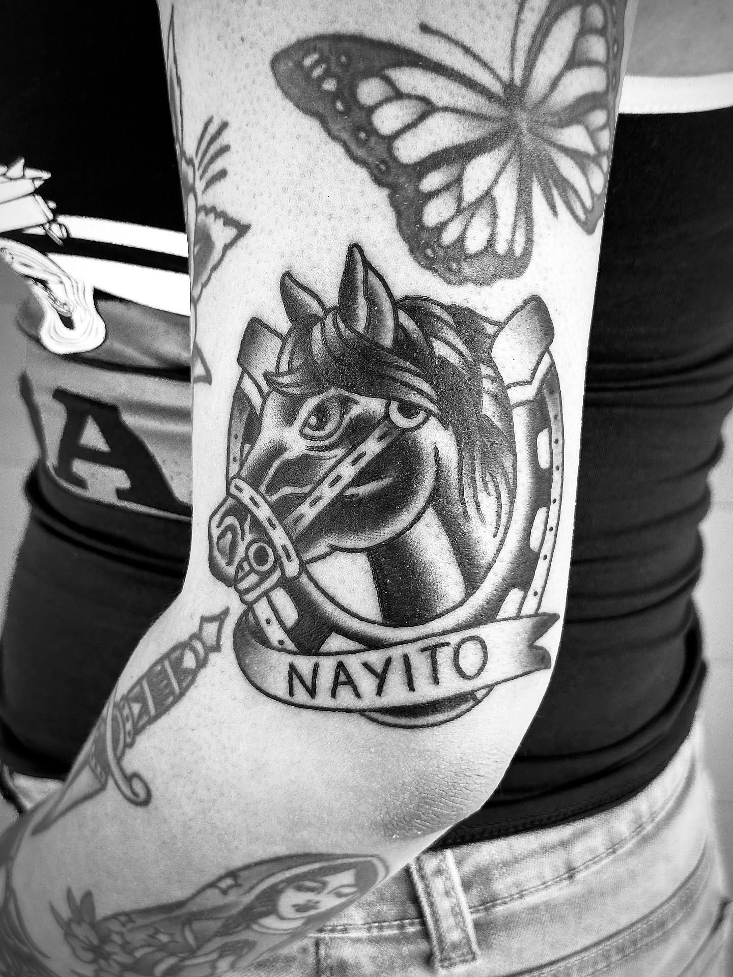Horse head with banner American traditional tattoo on the forearm by Michael Williams
