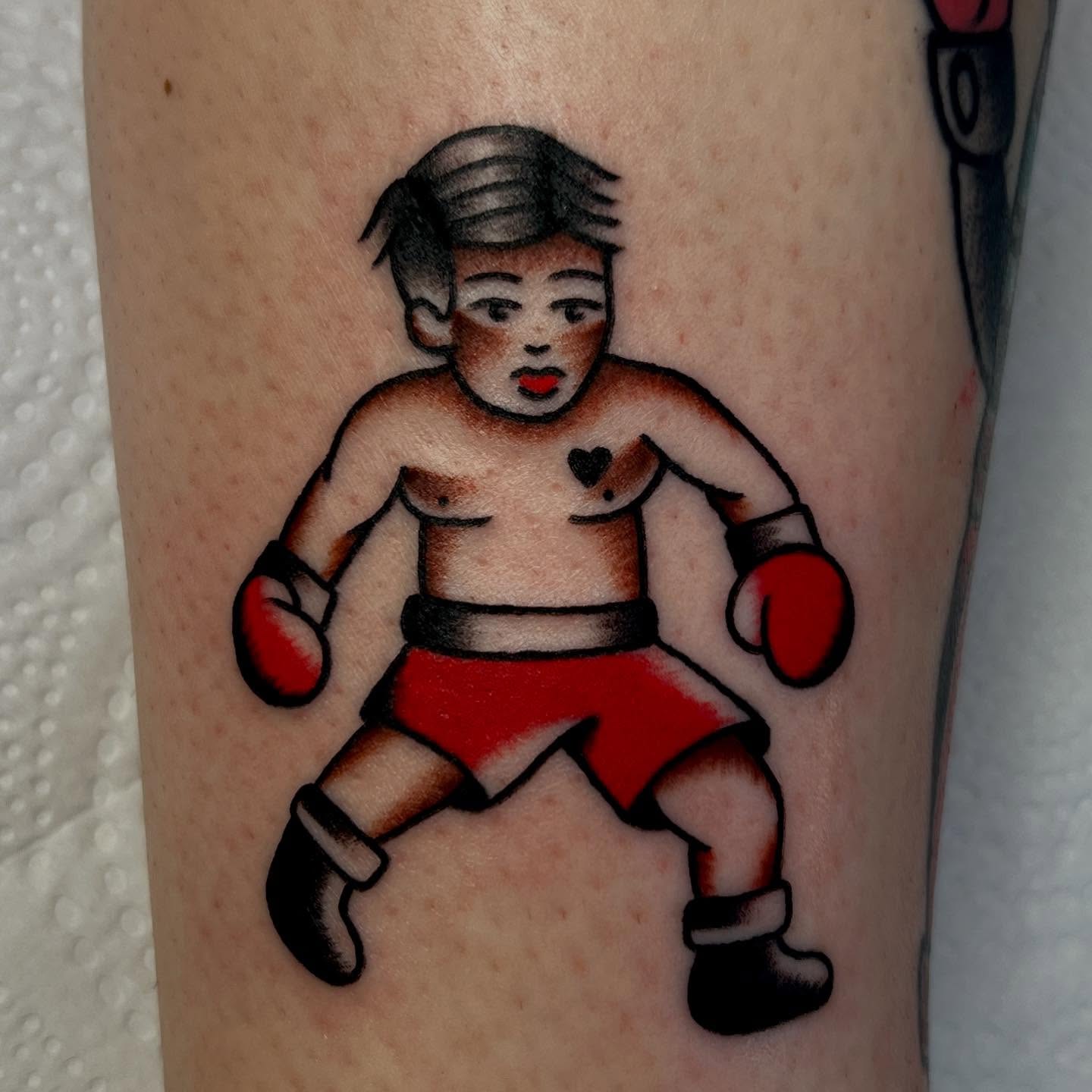 Boxing child American traditional tattoo on the forearm by Danica