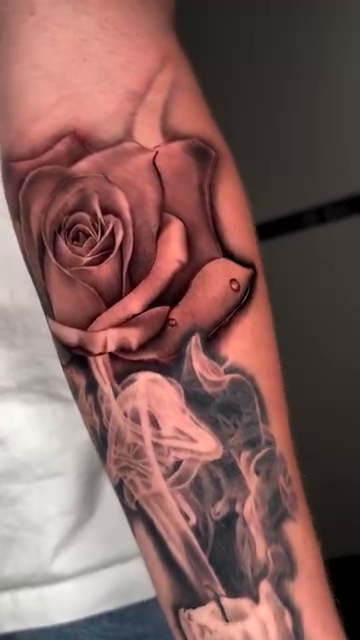 Rose and candle with smoke realism tattoo by Kaleb Trujillo