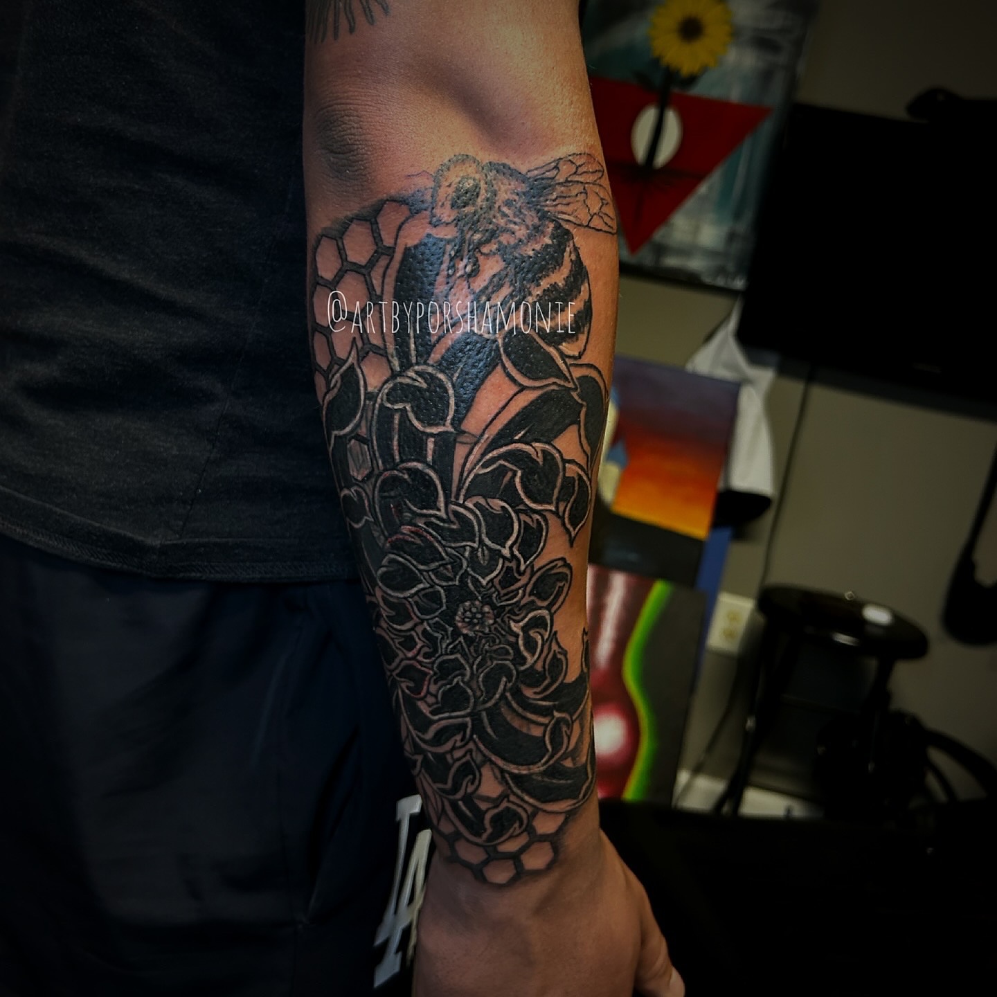 Beehive and floral geometric tattoo on the forearm by Porshamonie' THE Tattoo ARTIST