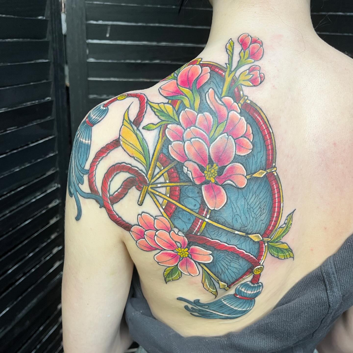 Floral arrangement American traditional tattoo on the shoulder by Michigan Tattoo Artist - Nadia Garver, Clinton Township, Michigan