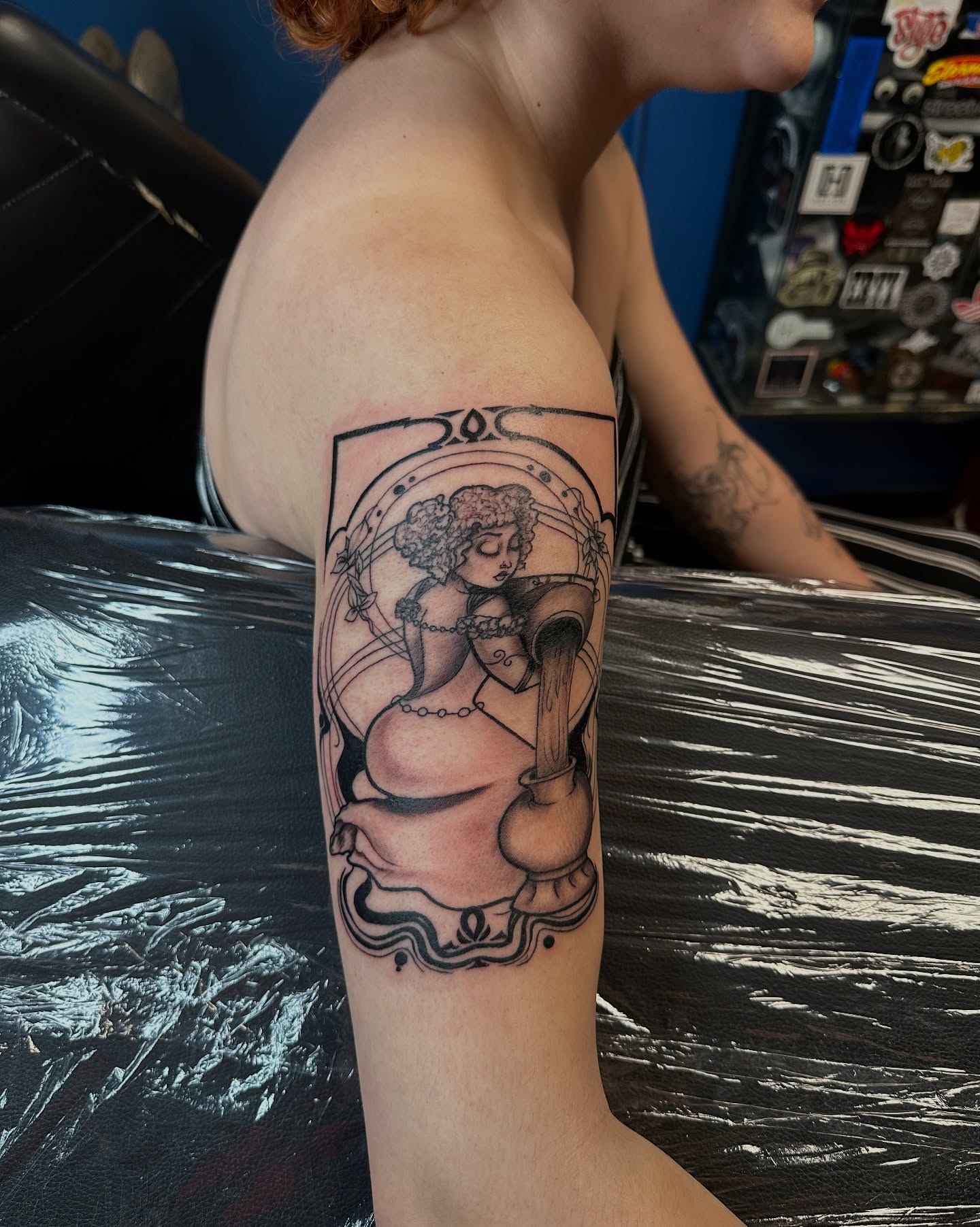 Woman with jug black and grey tattoo on the forearm by Juan c munoz jr, Chicago, Illinois