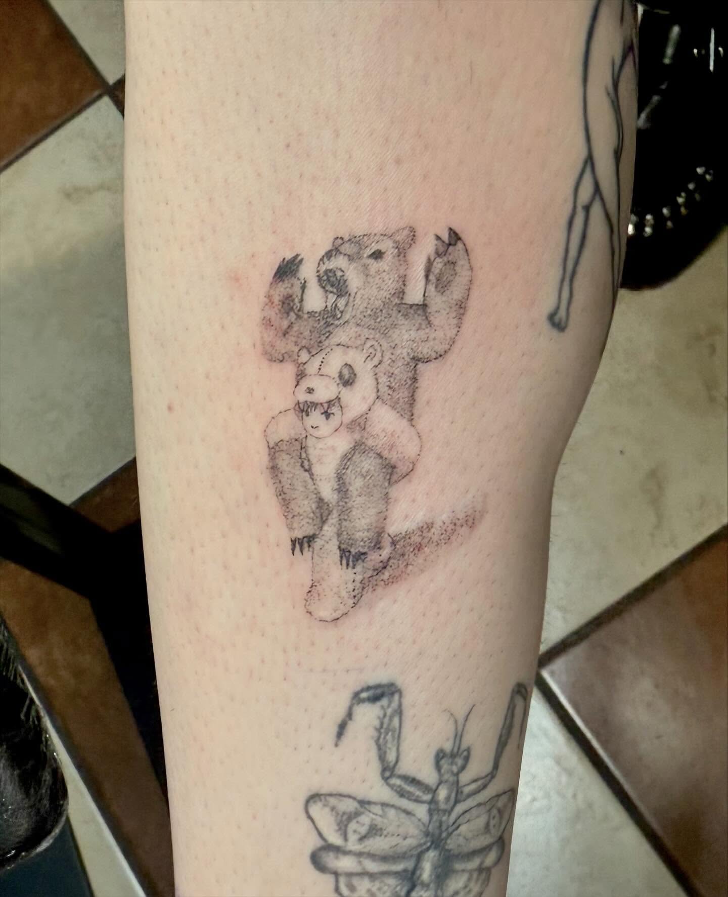 Bear and baby bear dotwork tattoo on the forearm by Nina Rush