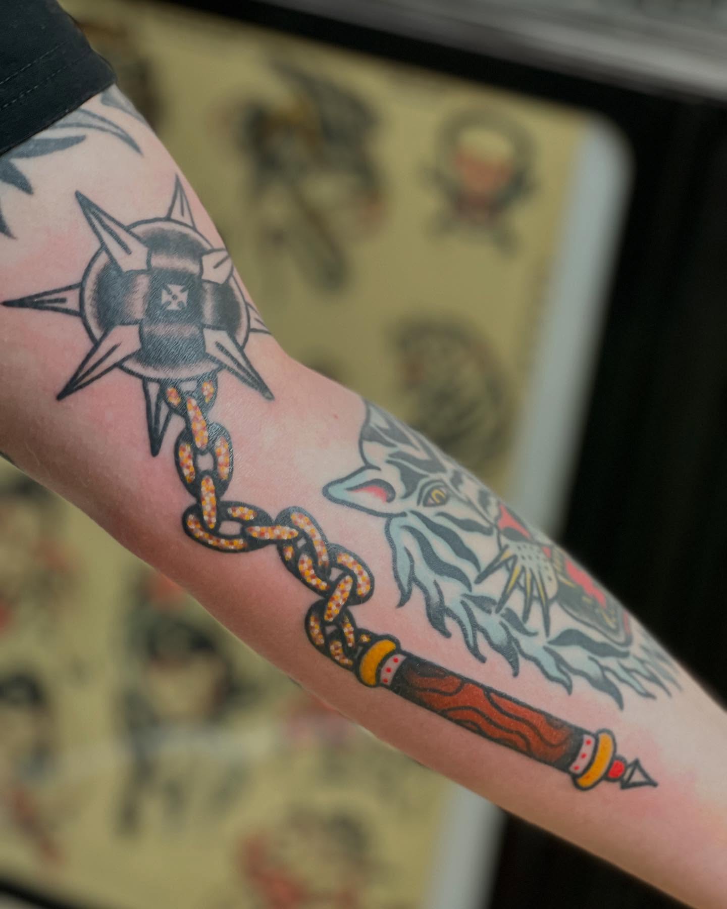 Chain and dagger American traditional tattoo on the forearm by Atom Aker
