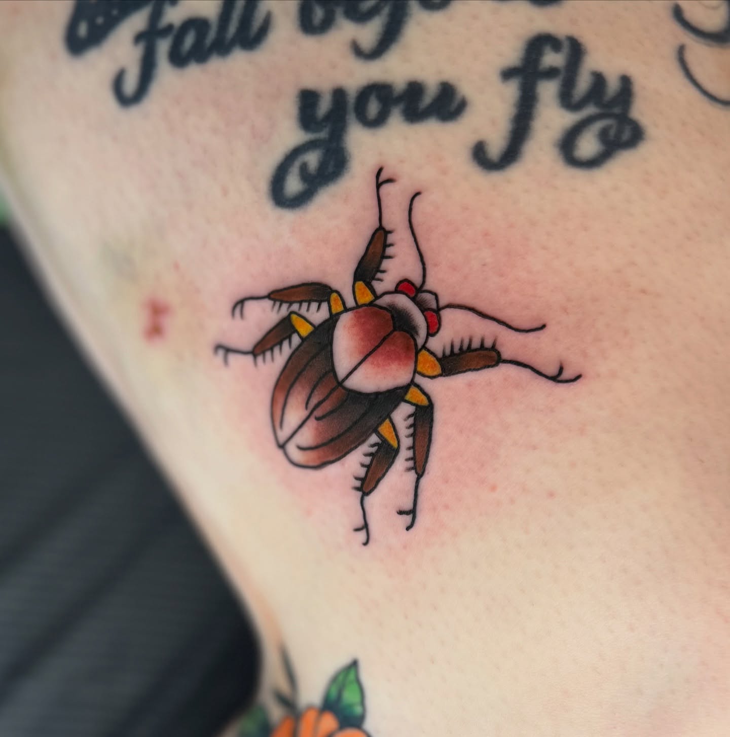 Beetle American traditional tattoo on the shoulder by Minxxy Tattoos