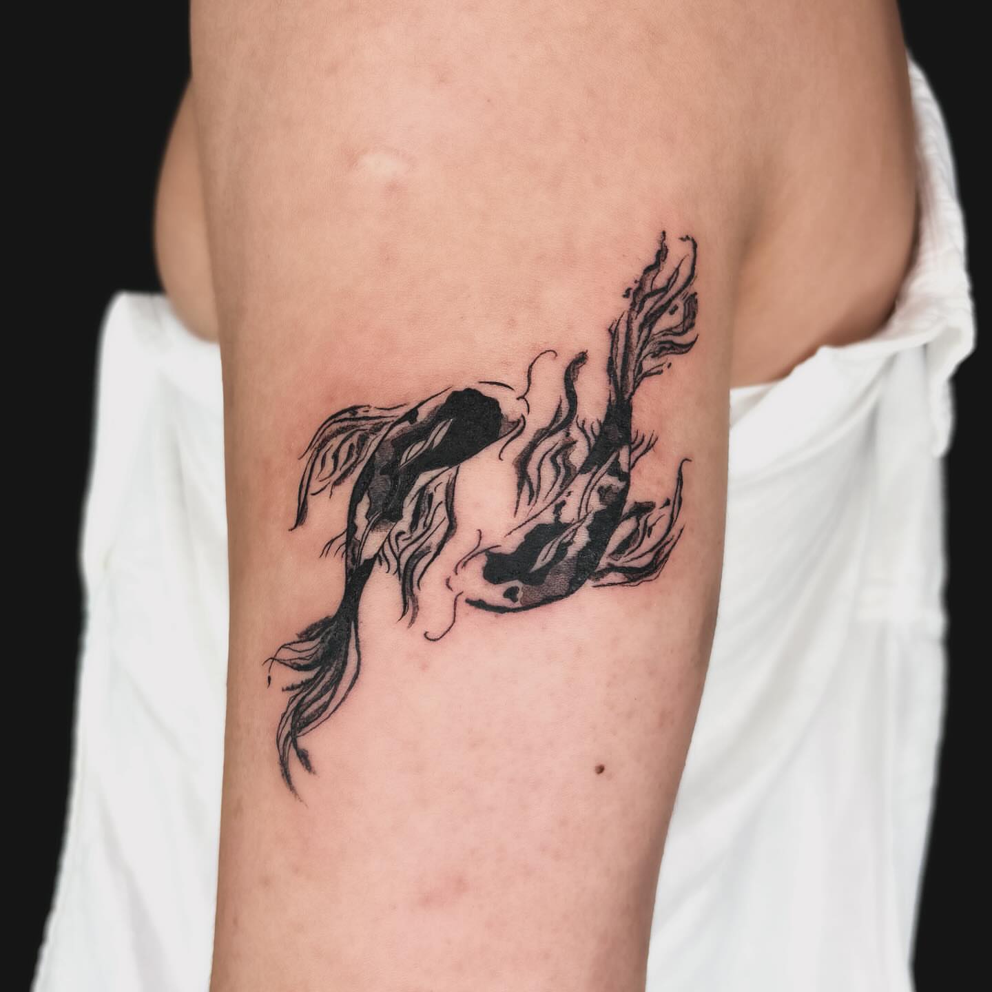 Fish black and grey tattoo on the forearm by *:・kelly✧*:・゚
