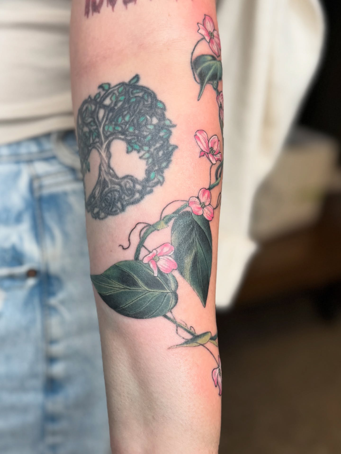 Tree of life with flowers neo-traditional tattoo on the forearm by Sydney