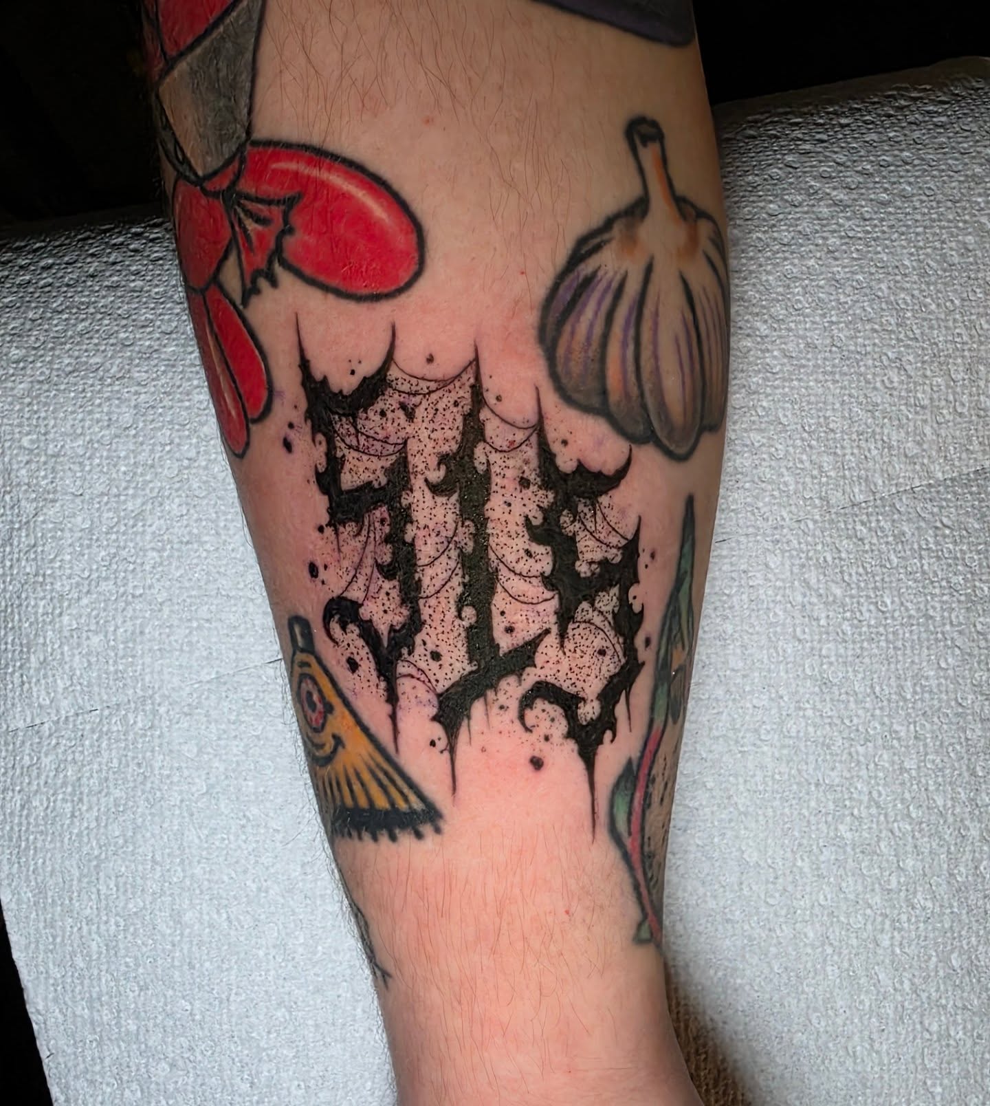 Skull dotwork tattoo on the calf by Kelsey Lorrae, Ankeny, Iowa