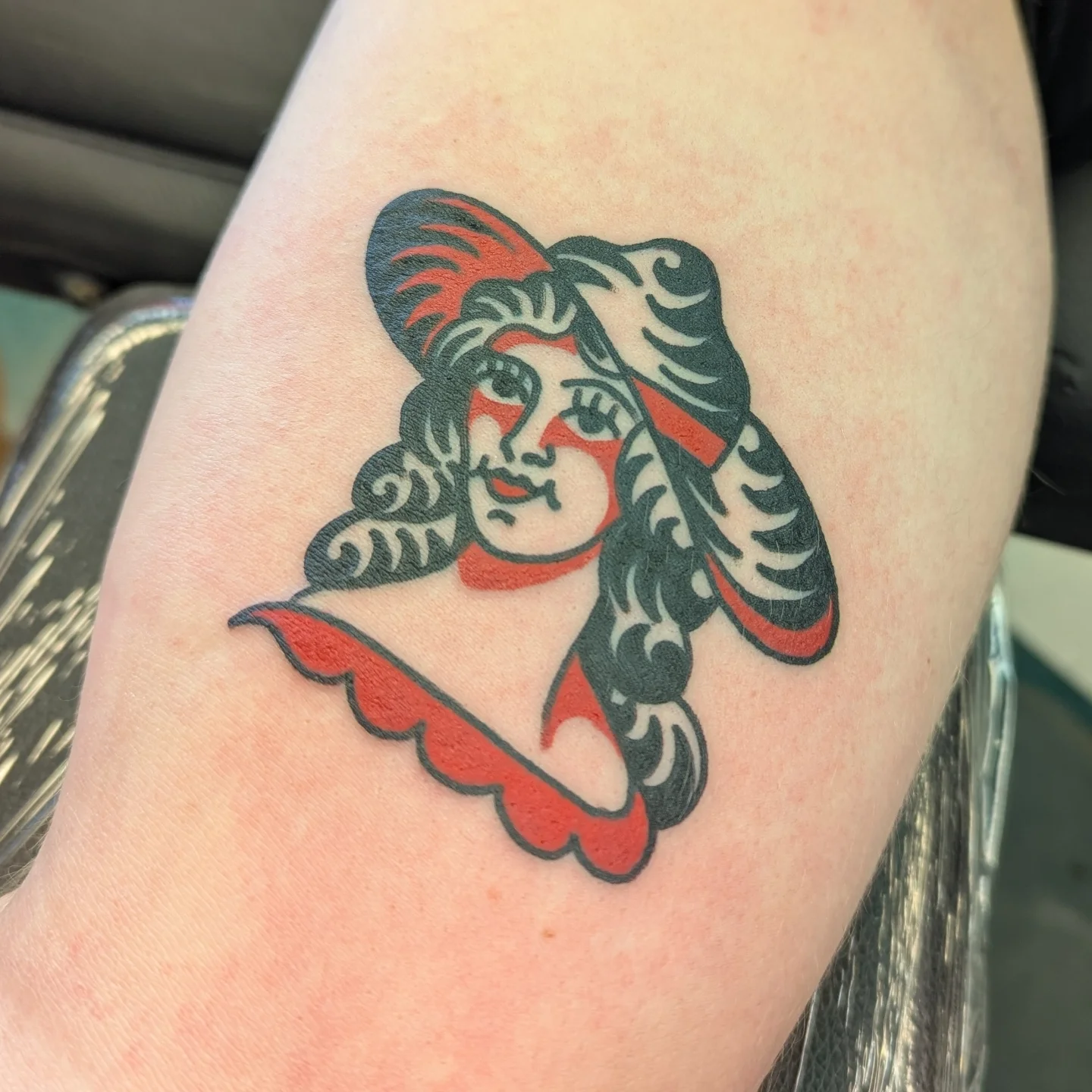 Flapper girl American traditional tattoo on the thigh by Zack Mueller