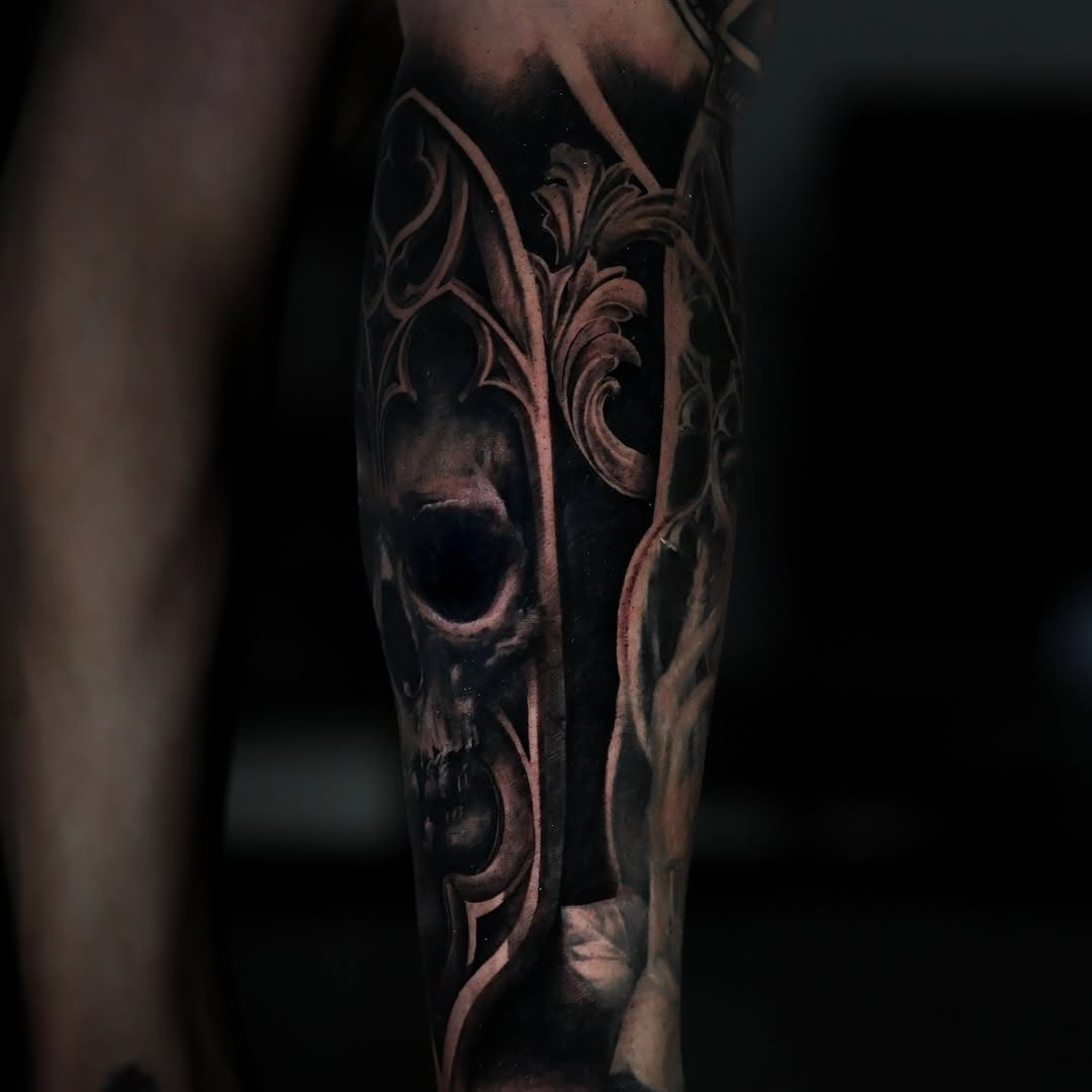 Skull and gothic architecture dark art tattoo on the forearm by Felipe Andrade