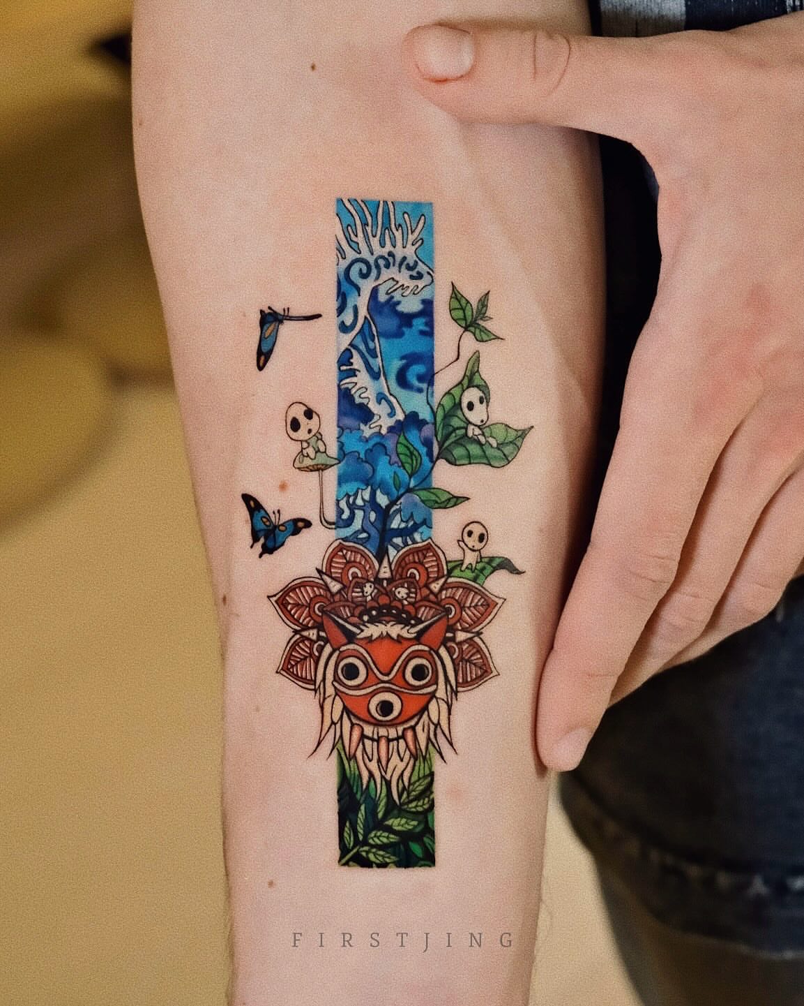 Mononoke mask anime tattoo on the forearm by Seattle