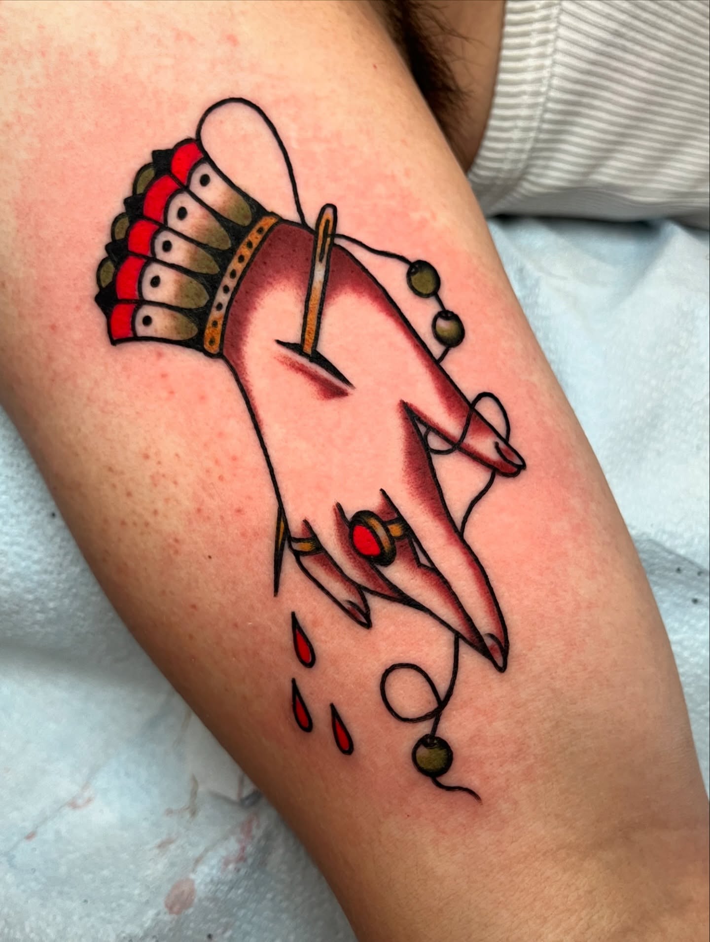 Hand with jewelry American traditional tattoo on the forearm by kate