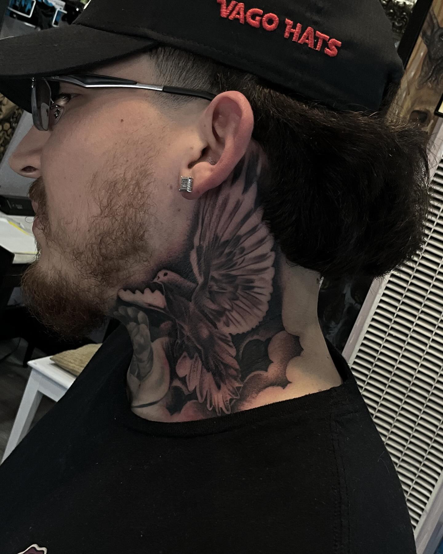 Bird and clouds black and grey tattoo on the neck by michael
