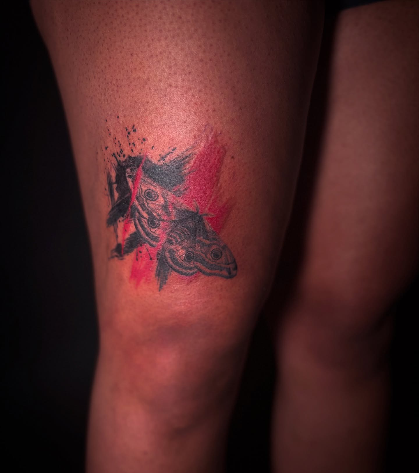 Butterfly dotwork tattoo on the thigh by Sarah Sacco