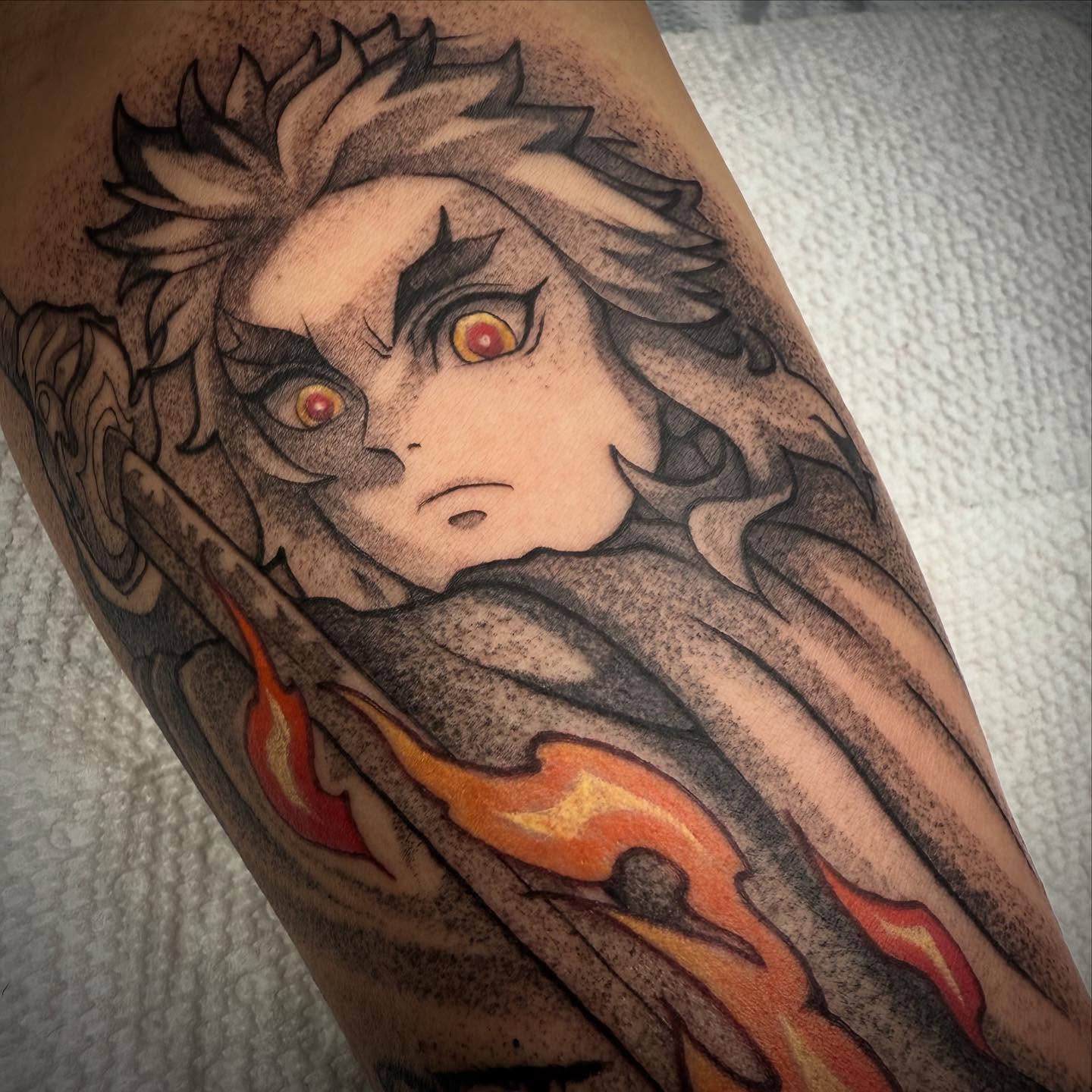 Anime character anime tattoo on the forearm by Angel Rodriguez