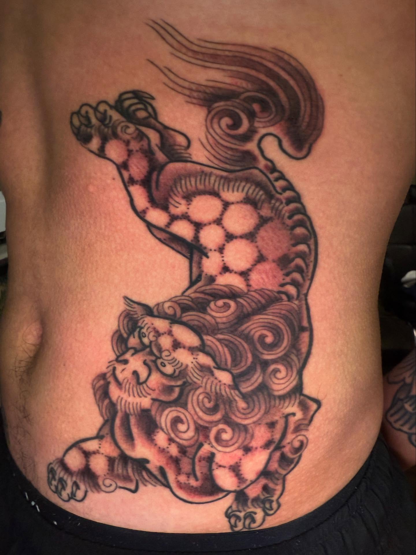 Lion and turtle japanese irezumi tattoo on the ribs by Mike Diamond