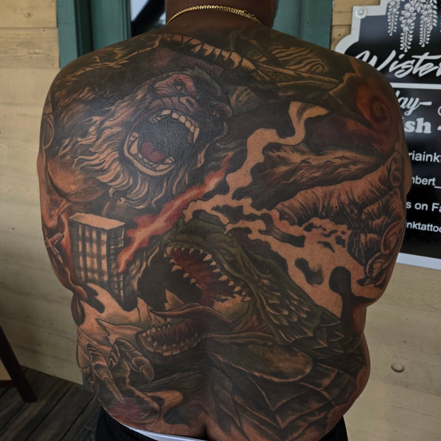 Monster attack realism tattoo on the back by Cody Lambert