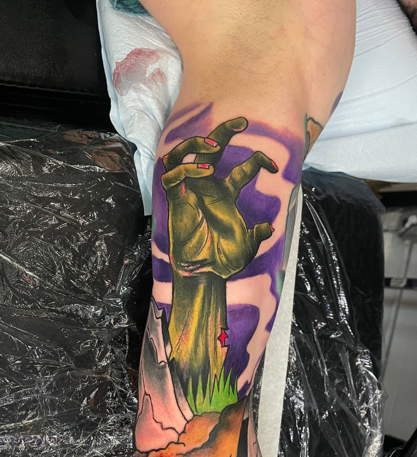Zombie hand realism tattoo on the forearm by Tivis Phillips