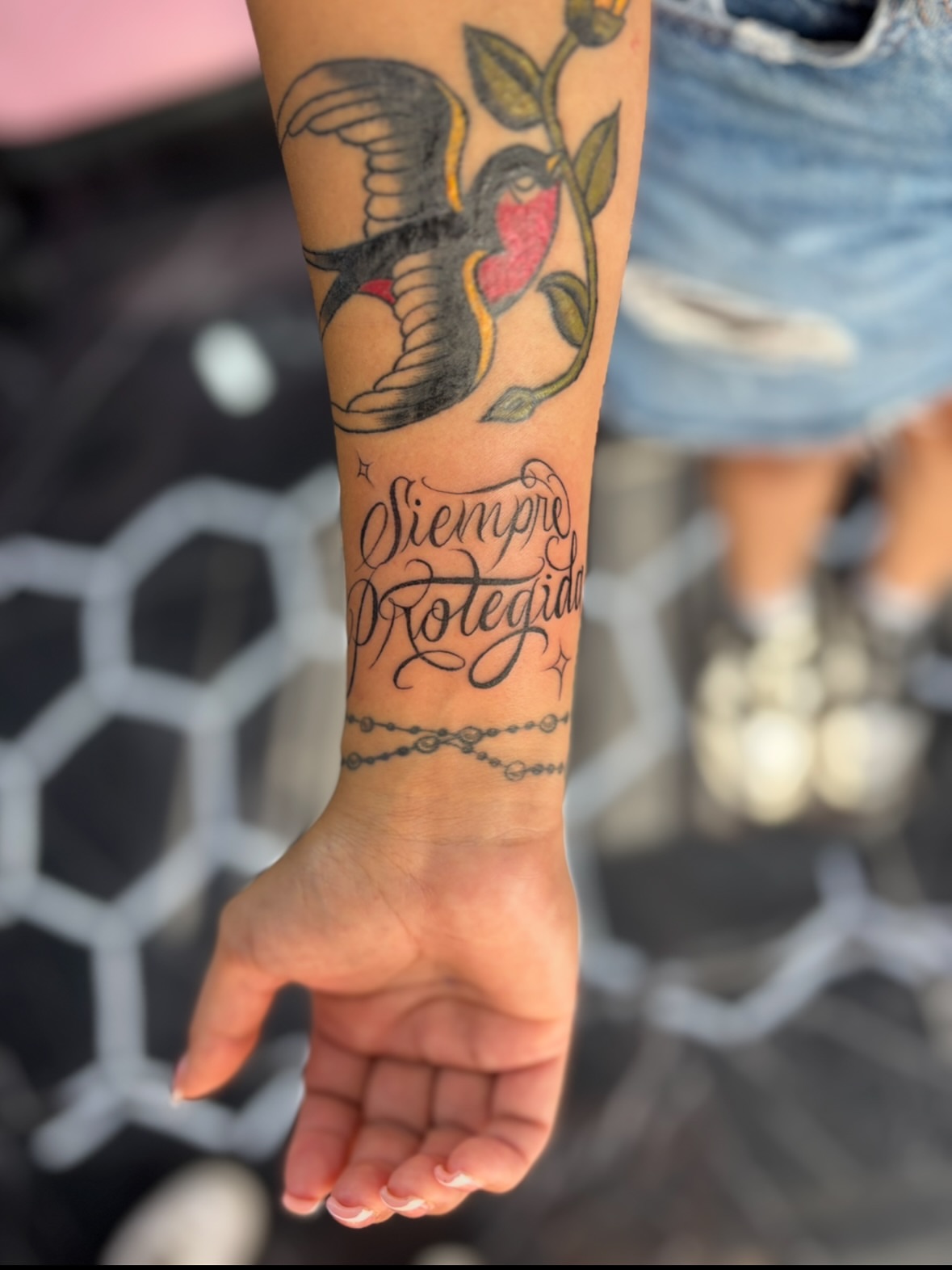 Hummingbird and heart American traditional tattoo on the forearm by $weet little leslie 🩶🧚🏻‍♀️