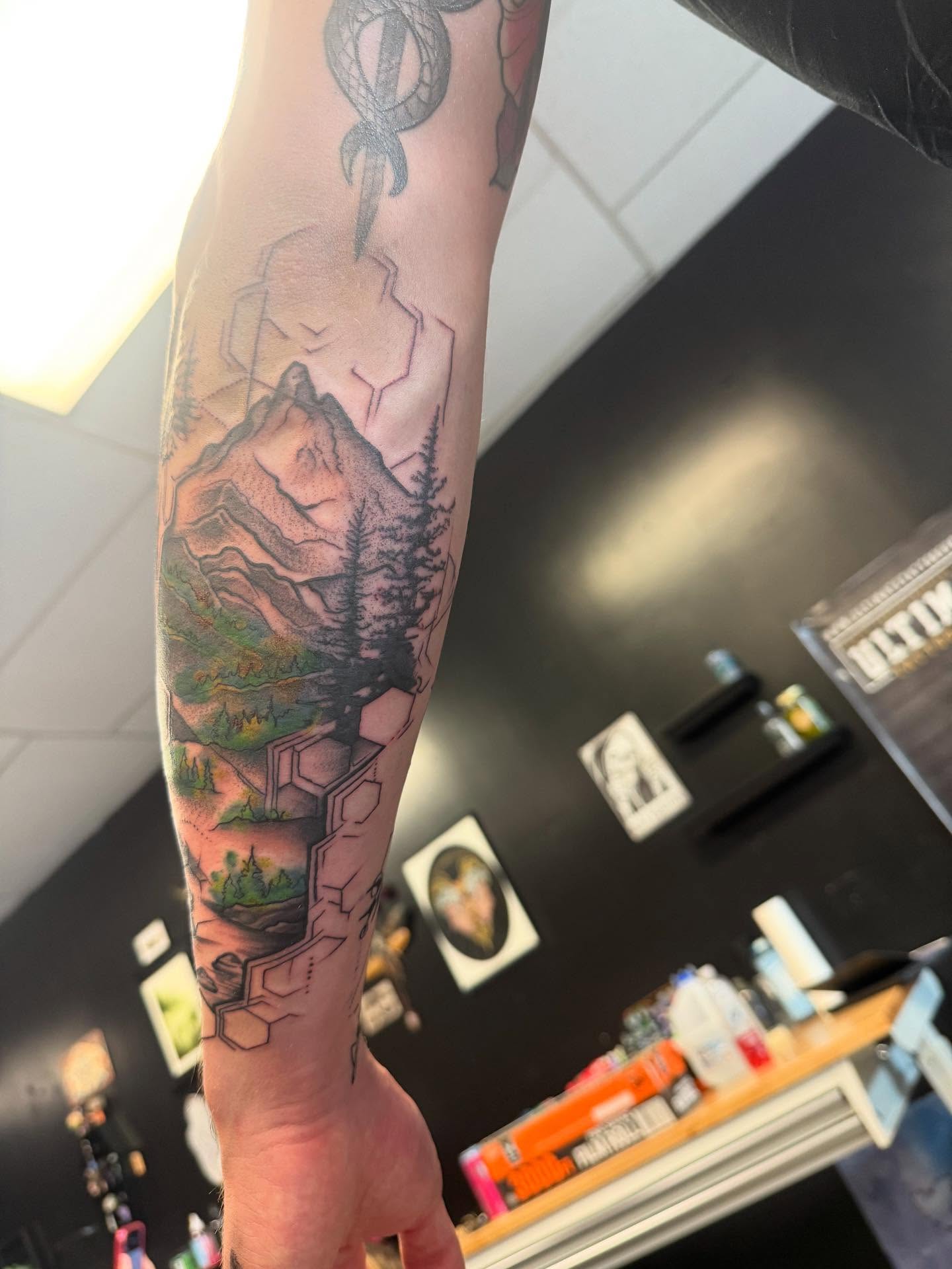 Tattoo by @scottys_ink315 — geometric, realism