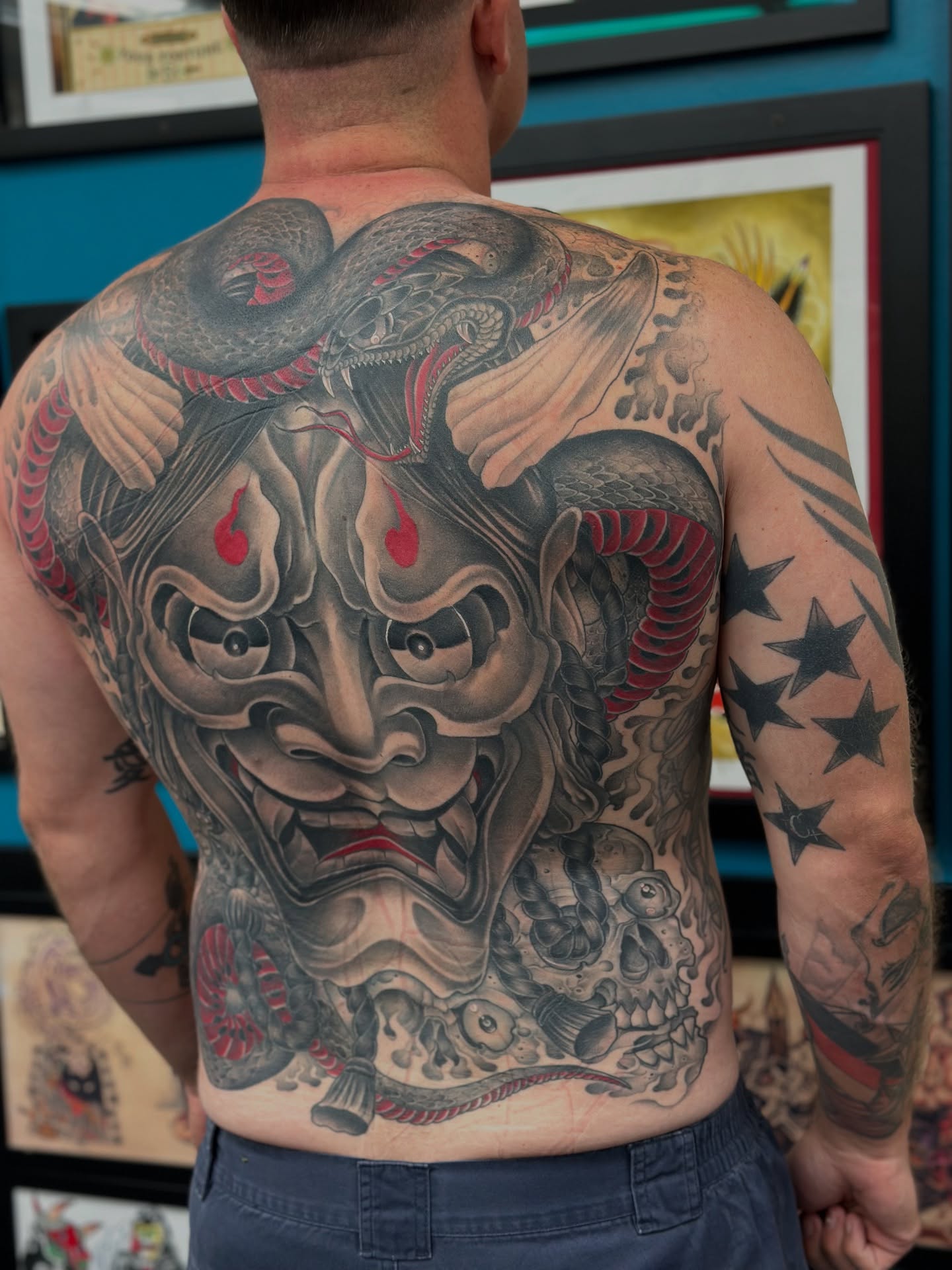 Demon mask japanese irezumi tattoo on the back by Stevie O'Dell