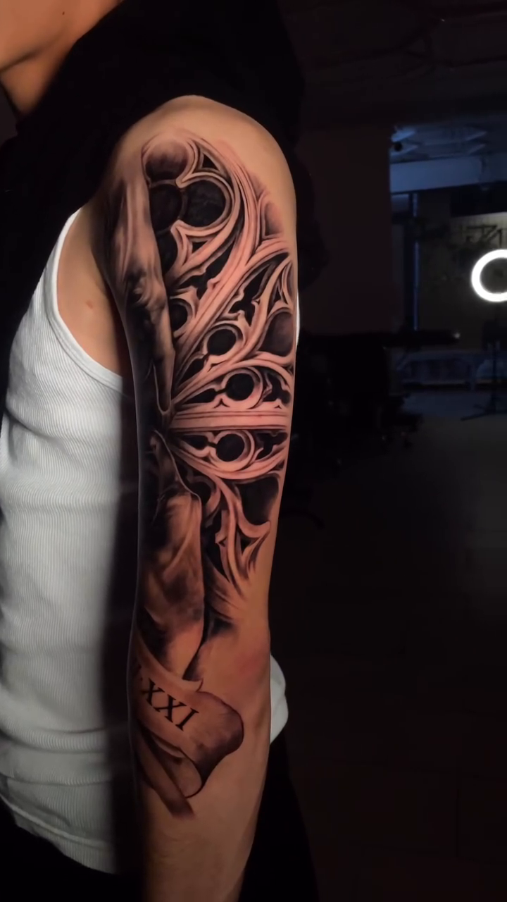 Tattoo by @_justin_reid_ — dark_realism, black_and_grey