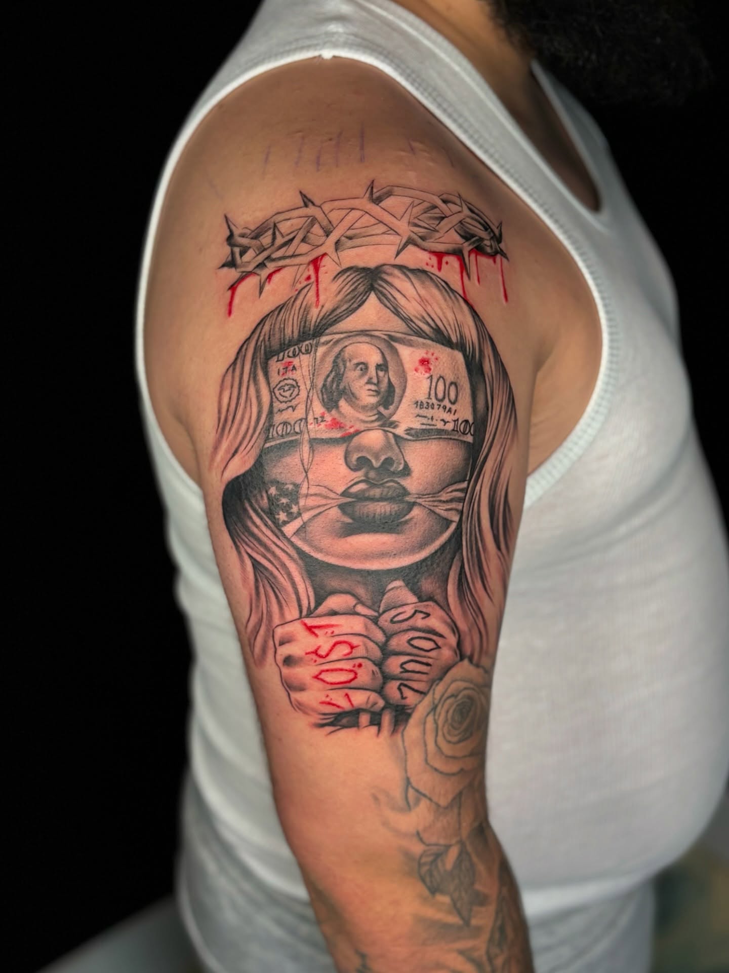 Woman with money American traditional tattoo on the upper arm by Jay Daartist