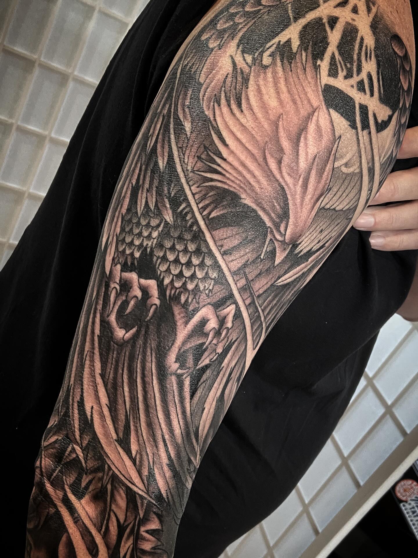 Dragon and lotus realism tattoo on the forearm by Tattoos by Dale Hupke, Lebanon, Ohio