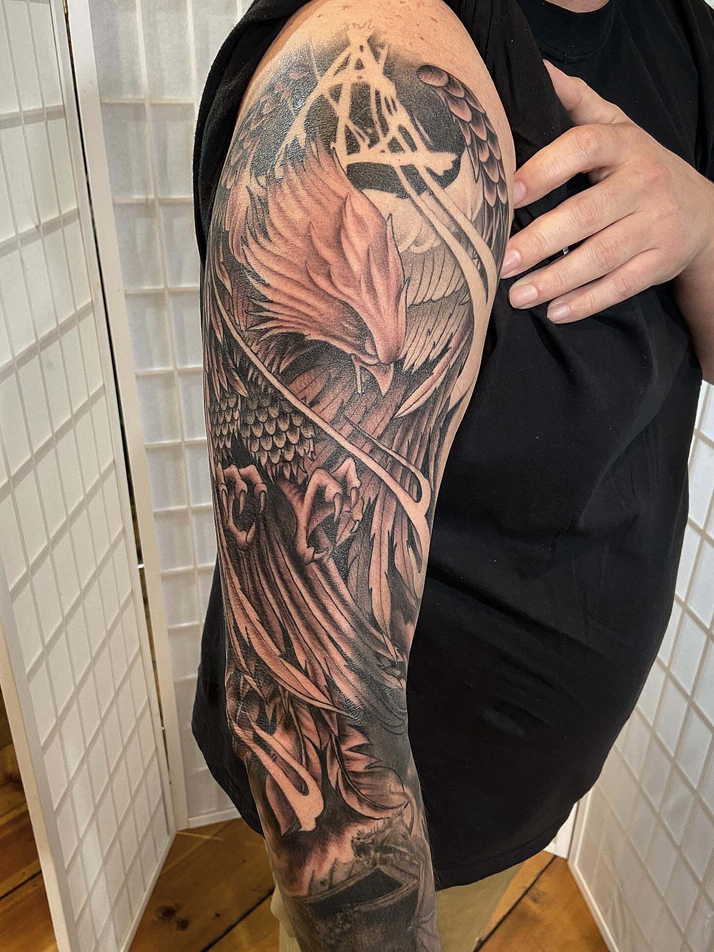 Phoenix realism tattoo on the upper arm by Tattoos by Dale Hupke, Lebanon, Ohio