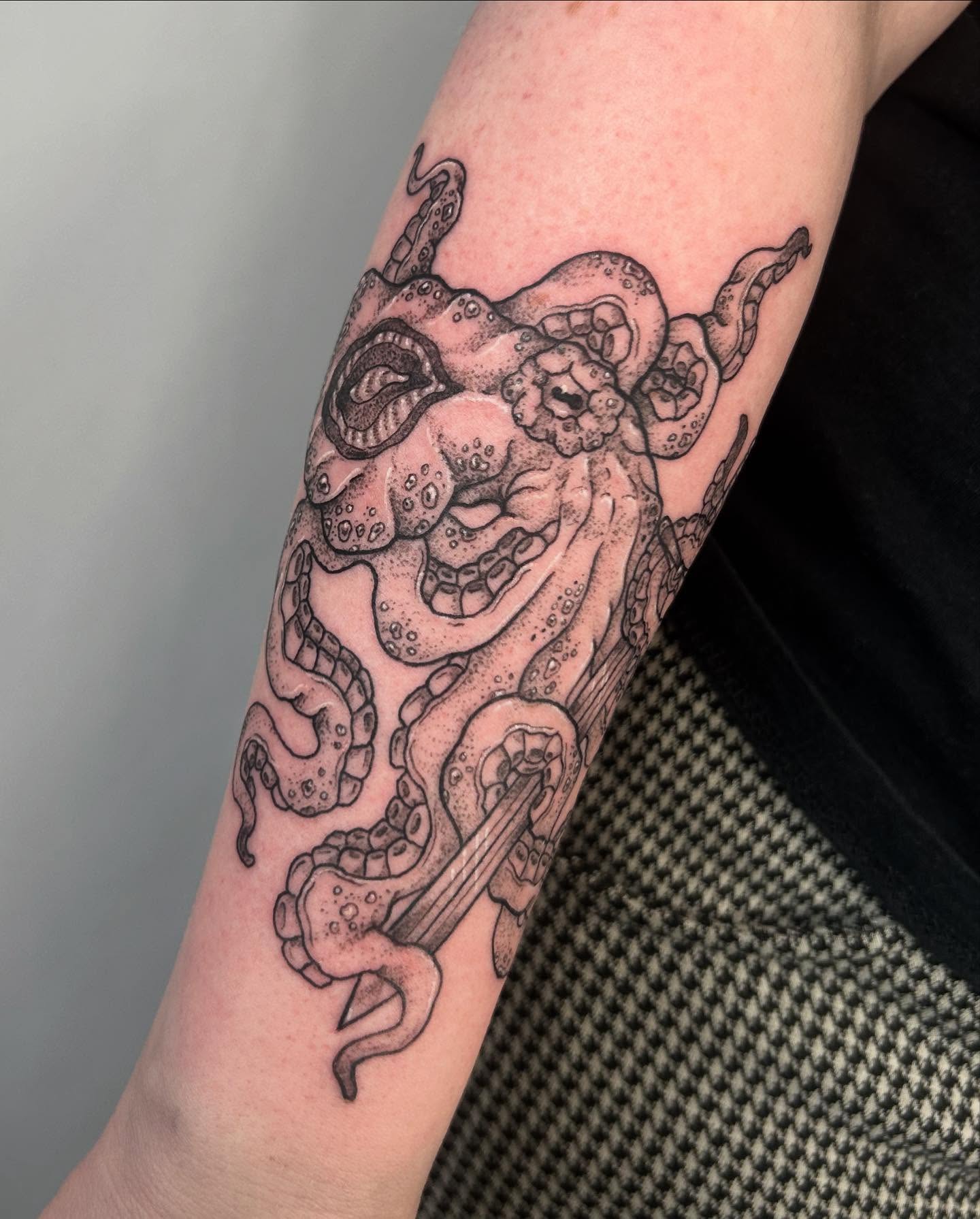Octopus dotwork tattoo on the forearm by Nikki Power
