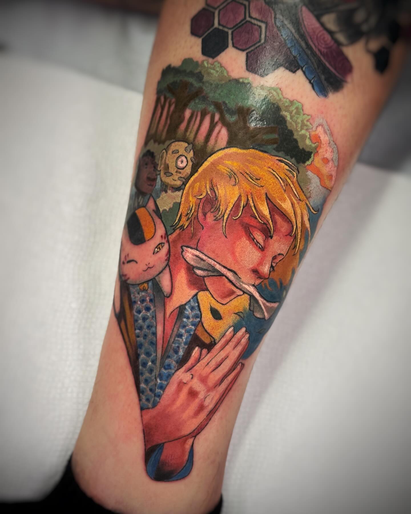Anime character anime tattoo on the forearm by Anna Saveria