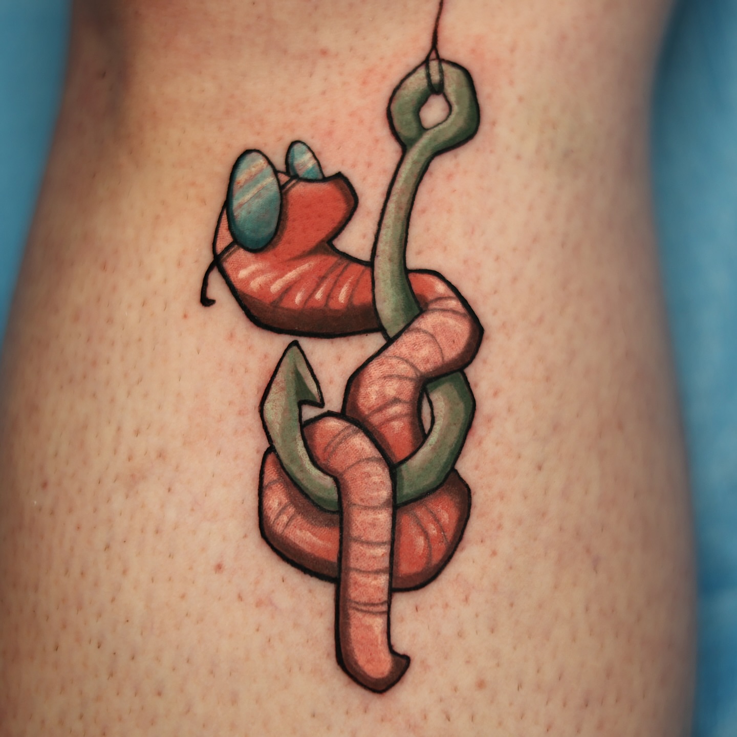 Worm American traditional tattoo on the thigh by Steve Gentile Tattoos
