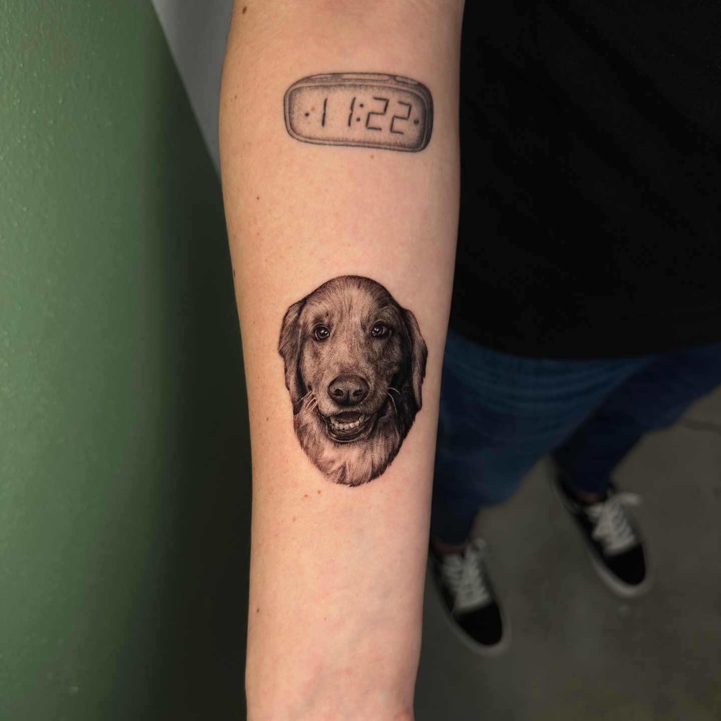 Dog realism tattoo on the forearm by Ninna