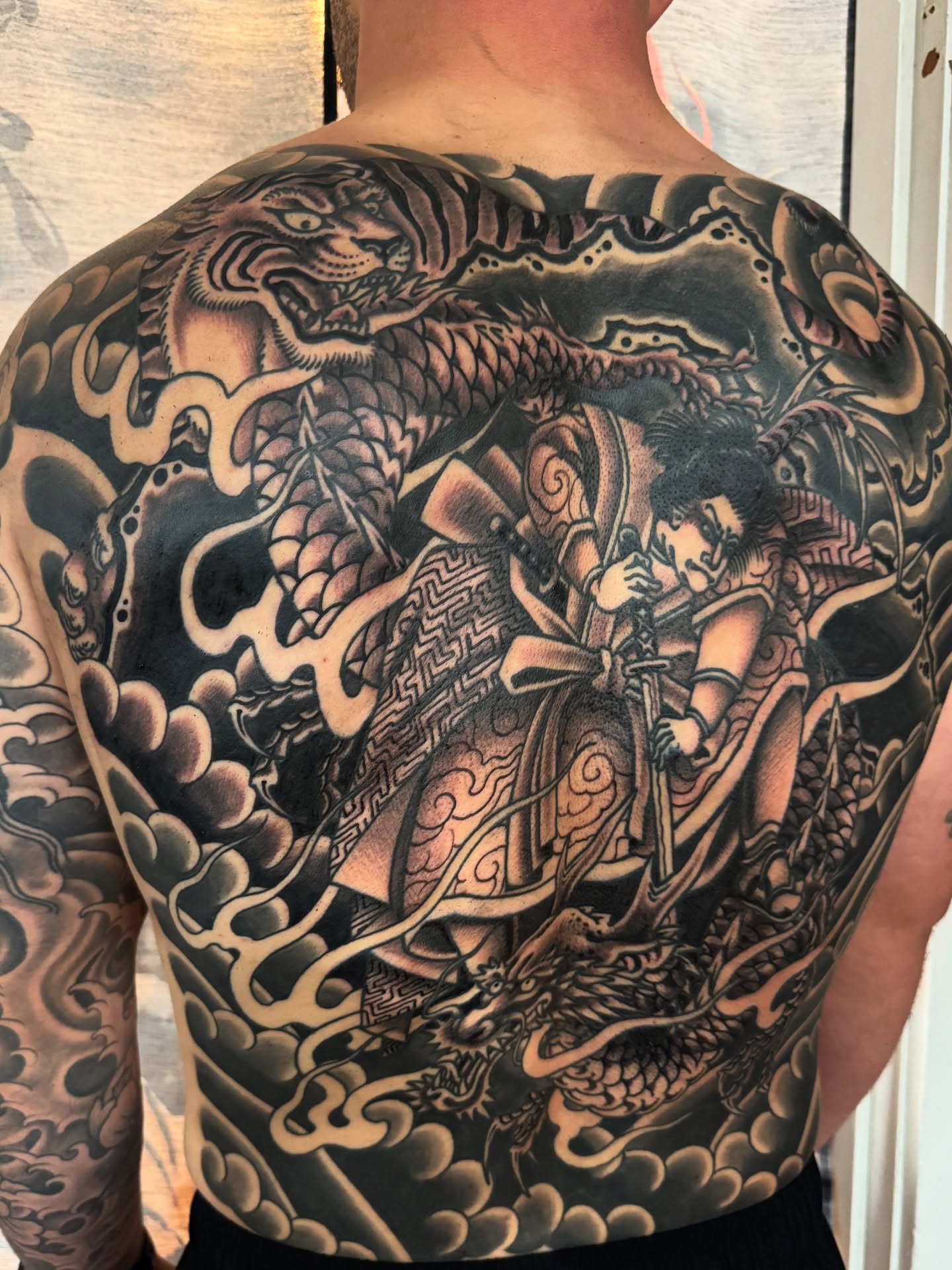 Tattoo by @nicholastidler_tattoos — japanese_irezumi, black_and_grey