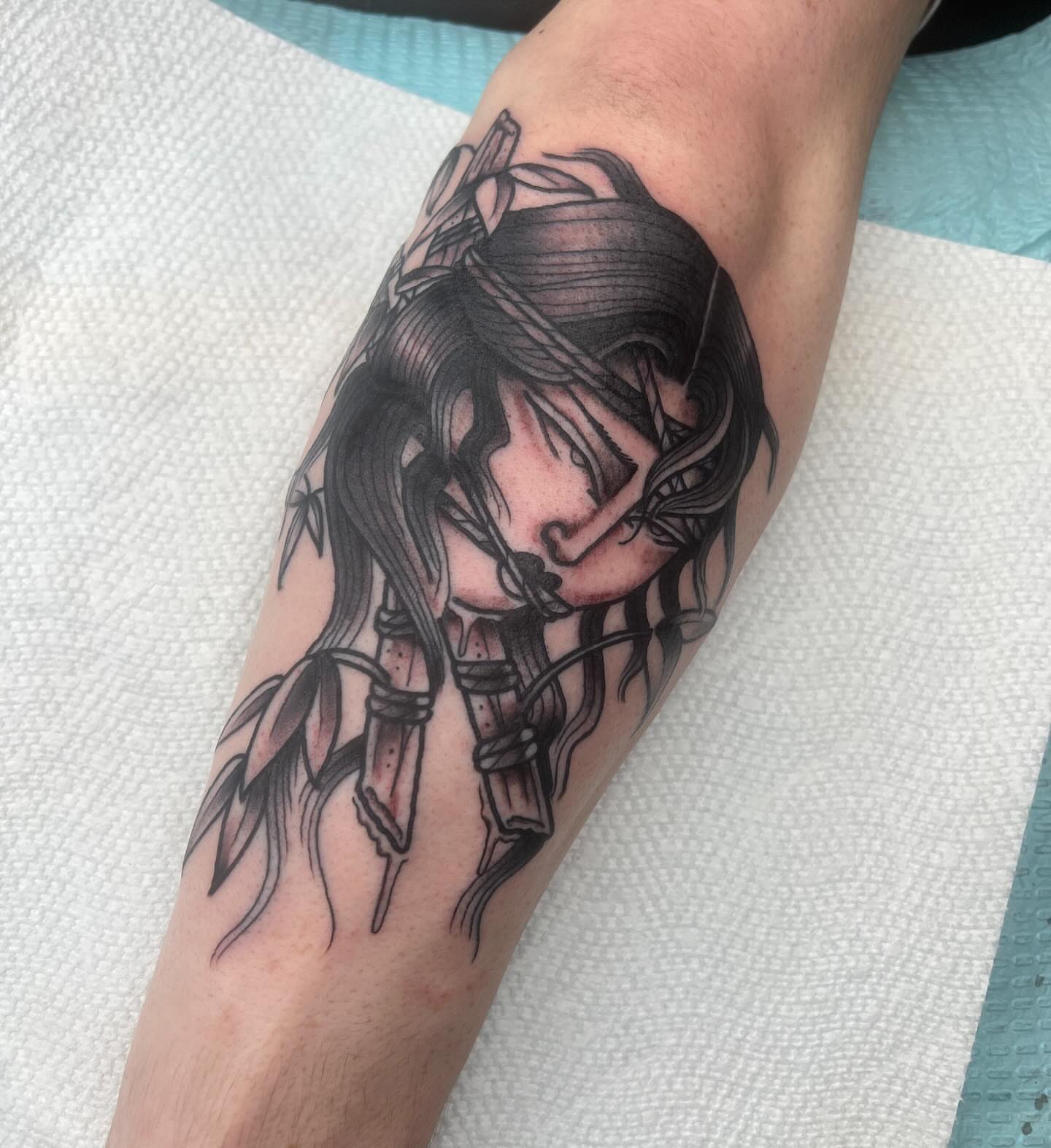 Anime character anime tattoo on the forearm by Mika Clairissa
