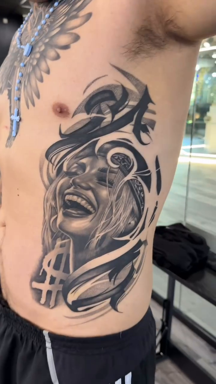 Tattoo by @rafa_inks — realism, black_and_grey