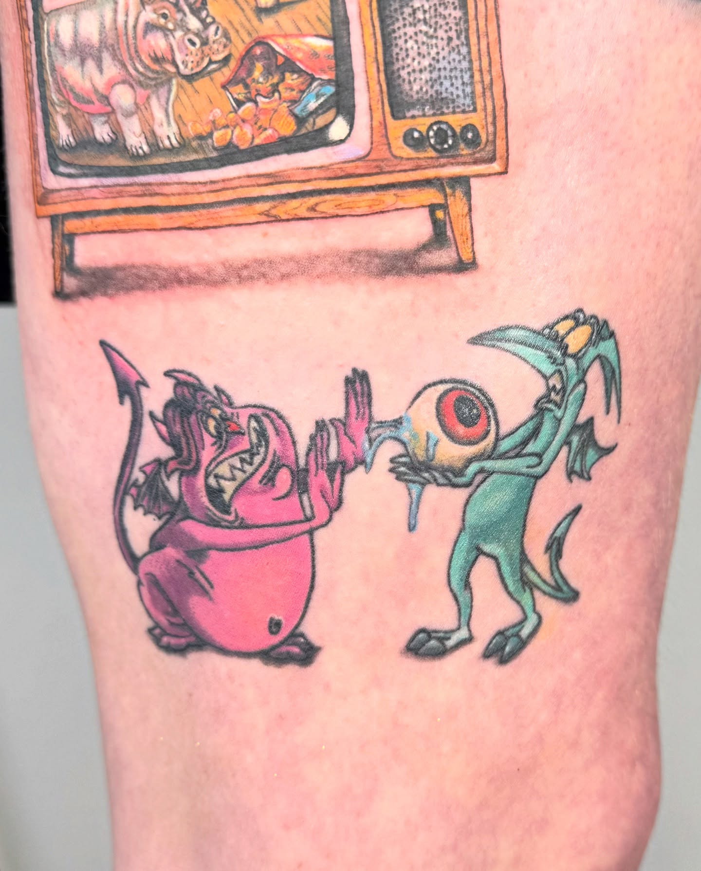 Monsters surrealism tattoo on the forearm by Franky A Bonifacio, Seattle, Washington