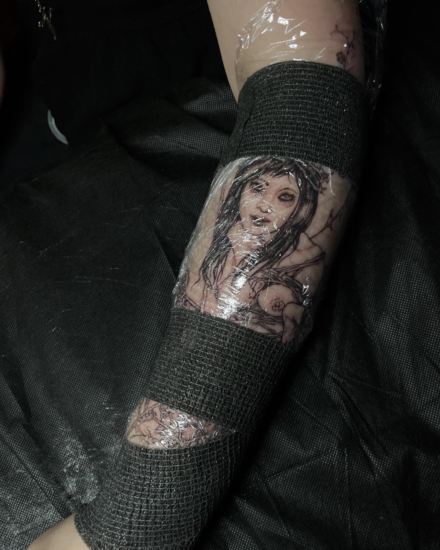 Woman realism tattoo on the forearm by Jamie Draven 🐺