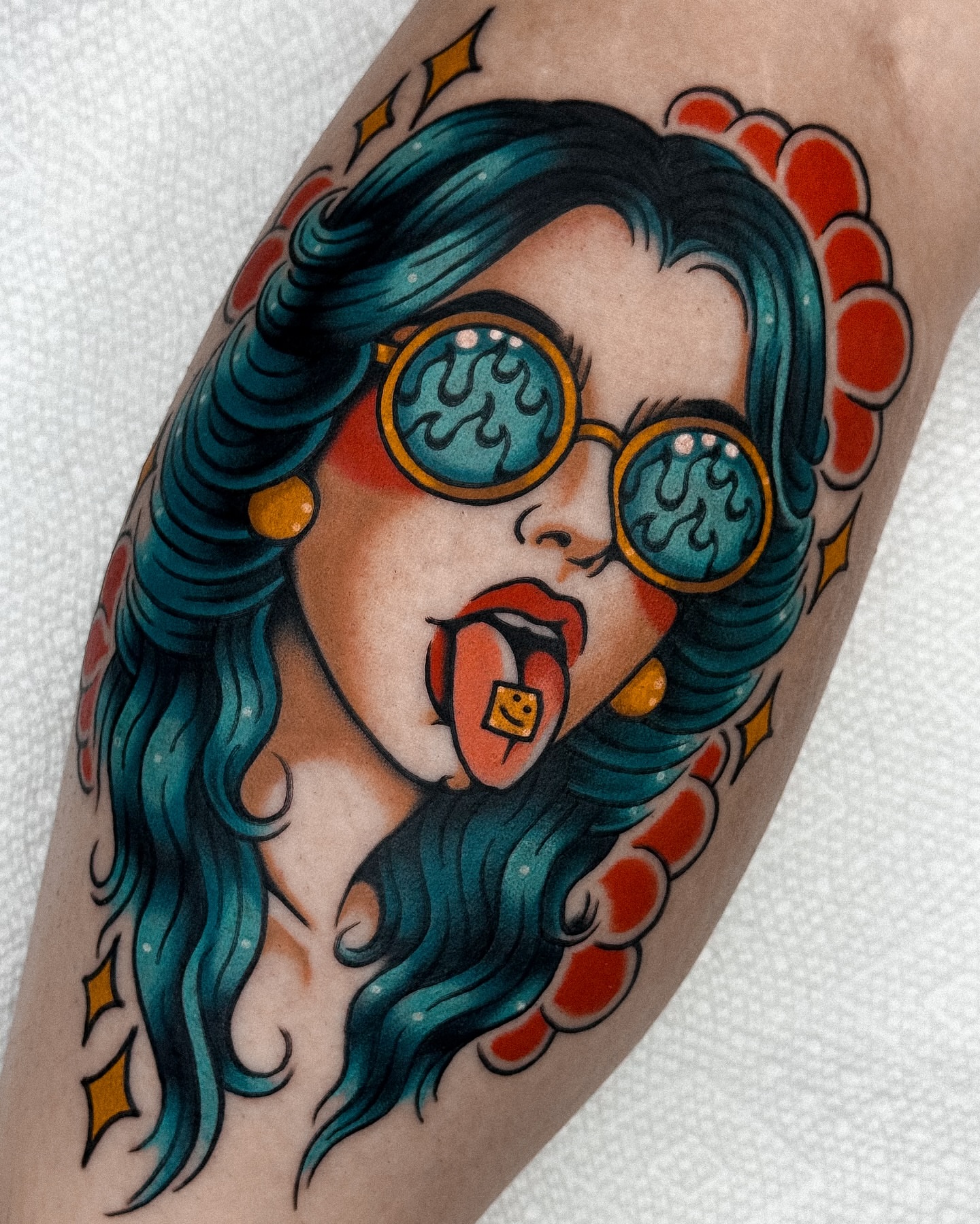 Woman with sunglasses American traditional tattoo on the forearm by Samuel Dickey