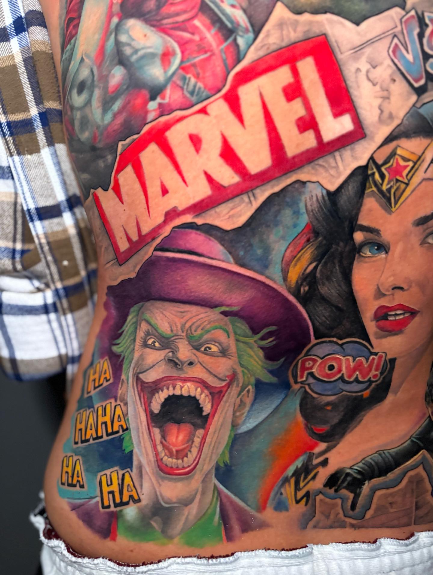 Joker realism tattoo on the torso by Taylor Steckman