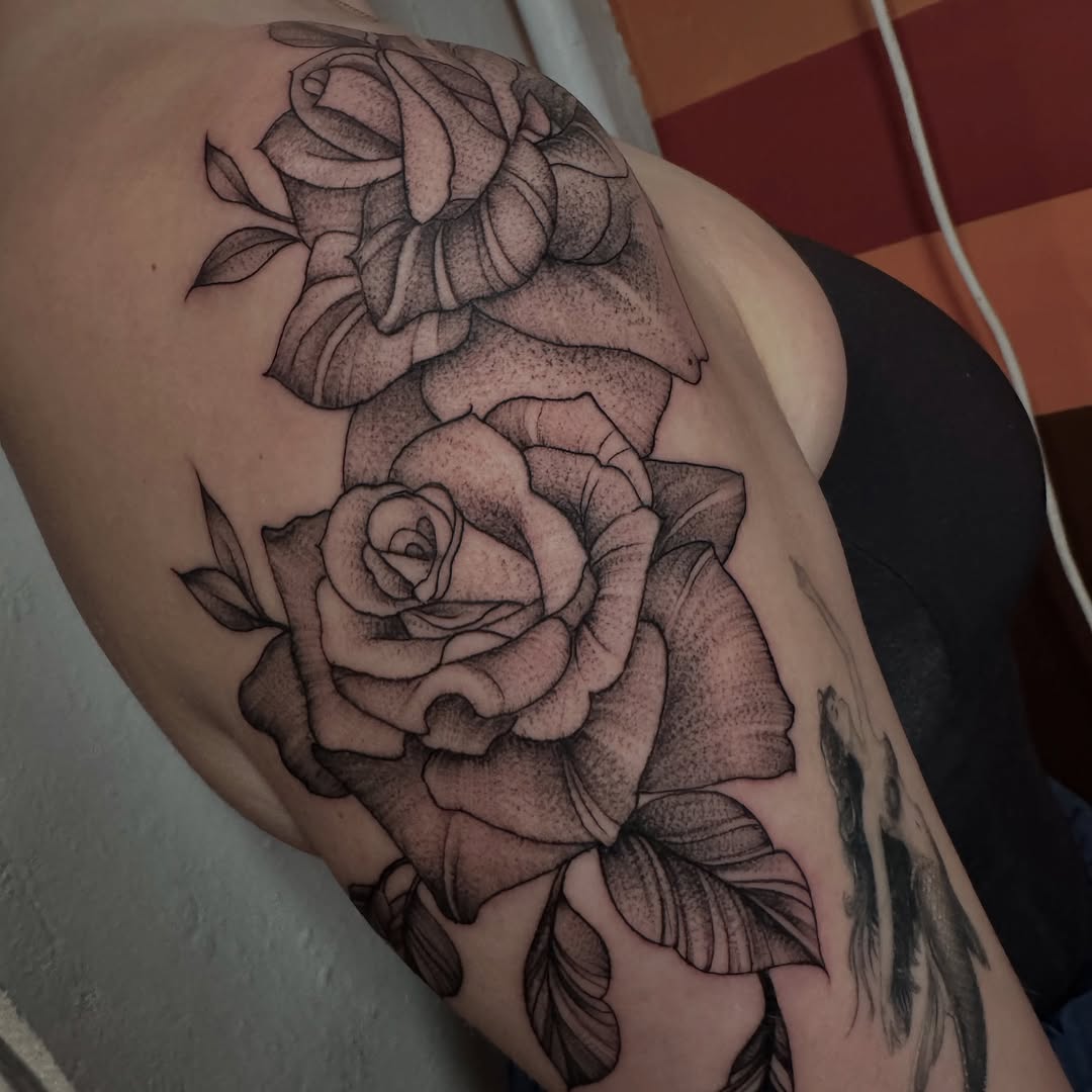 Roses dotwork tattoo on the thigh by Lisa Nikolopoulos, New York, New York