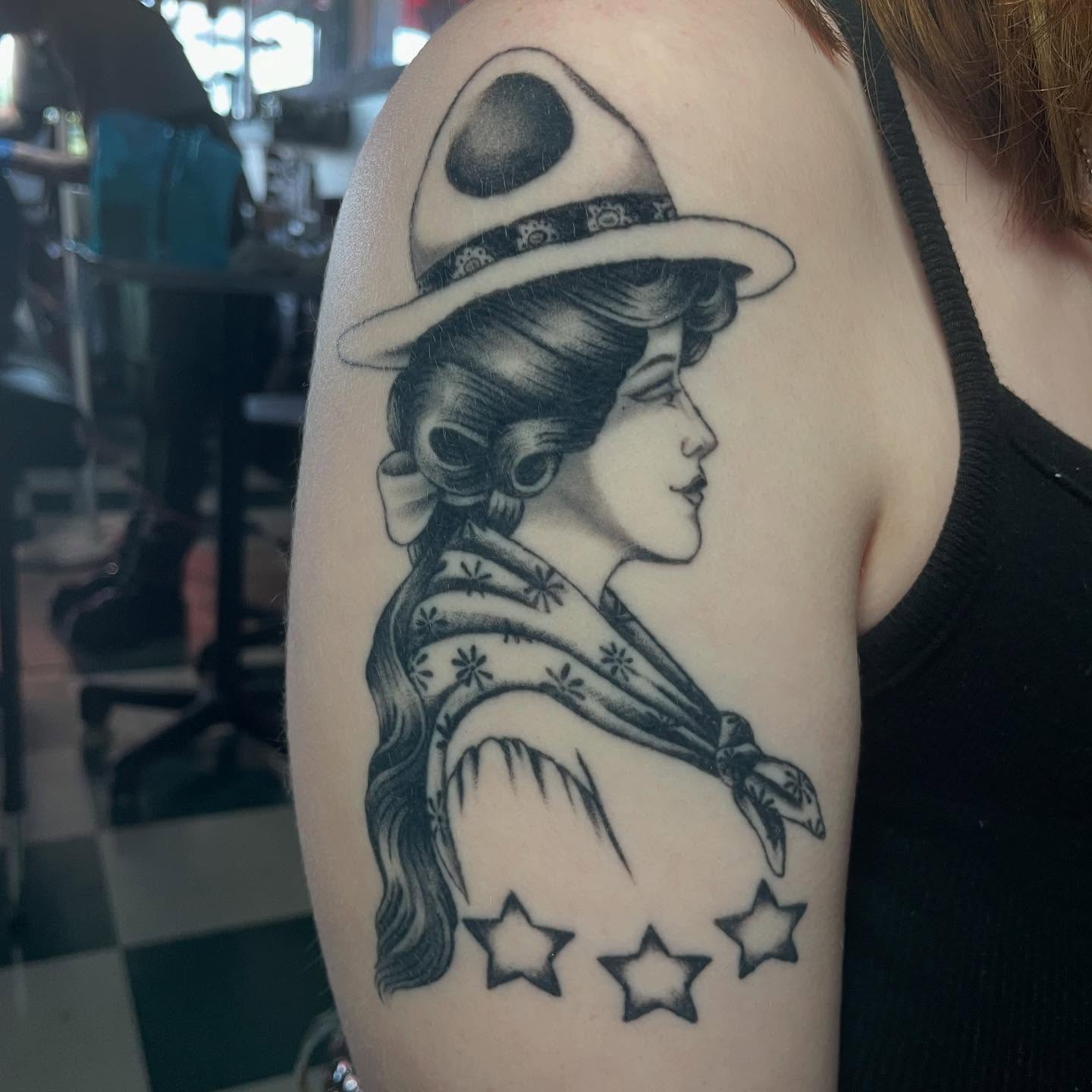 Cowgirl American traditional tattoo on the shoulder by Dayton Tattoo Artist, Miamisburg, Ohio