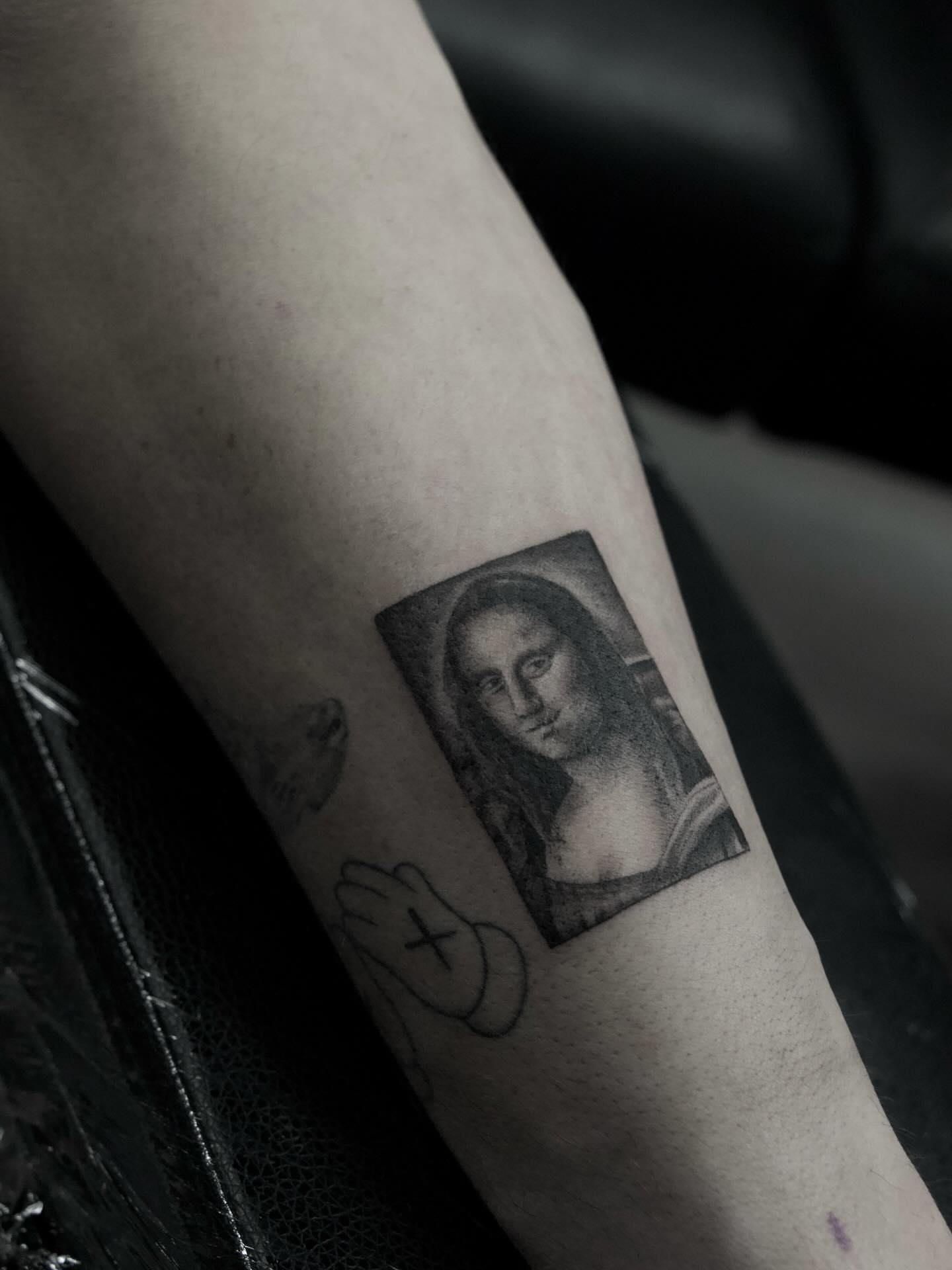 Mona lisa realism tattoo on the forearm by Alex Suarez