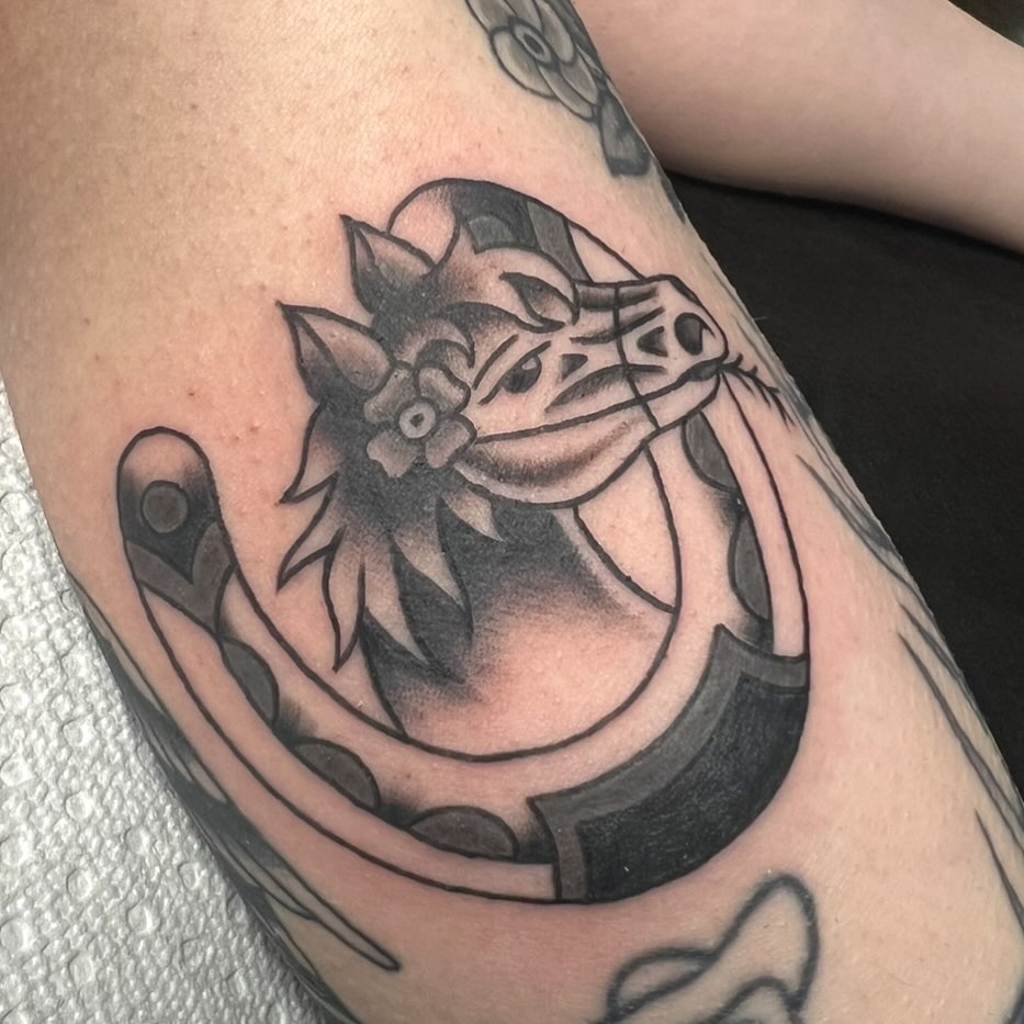 Horse with flower black and grey tattoo on the forearm by ✮KAT✮