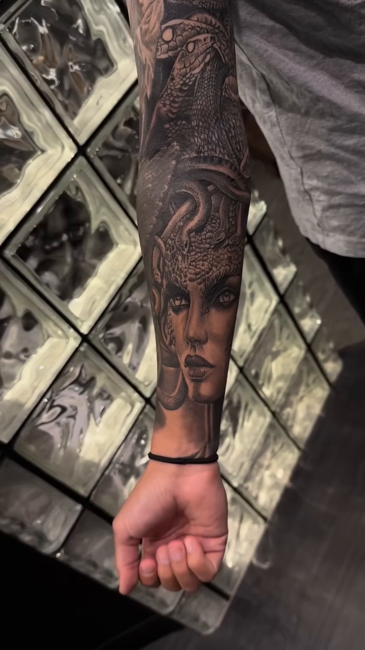 Tattoo by @hector_tatt2z — realism, black_and_grey